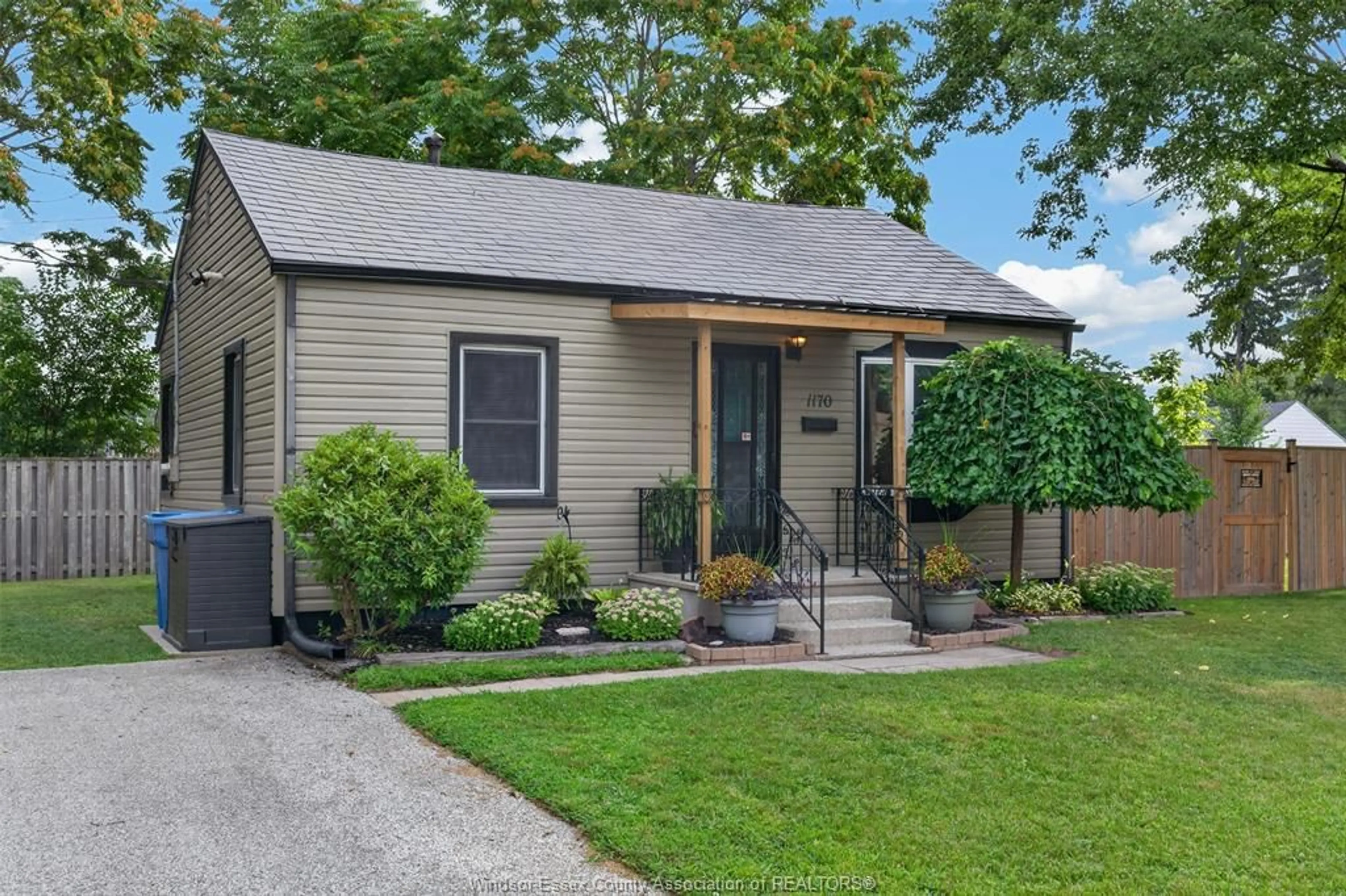 Home with vinyl exterior material, street for 1170 STRATHMORE AVE, Windsor Ontario N9C 3N5