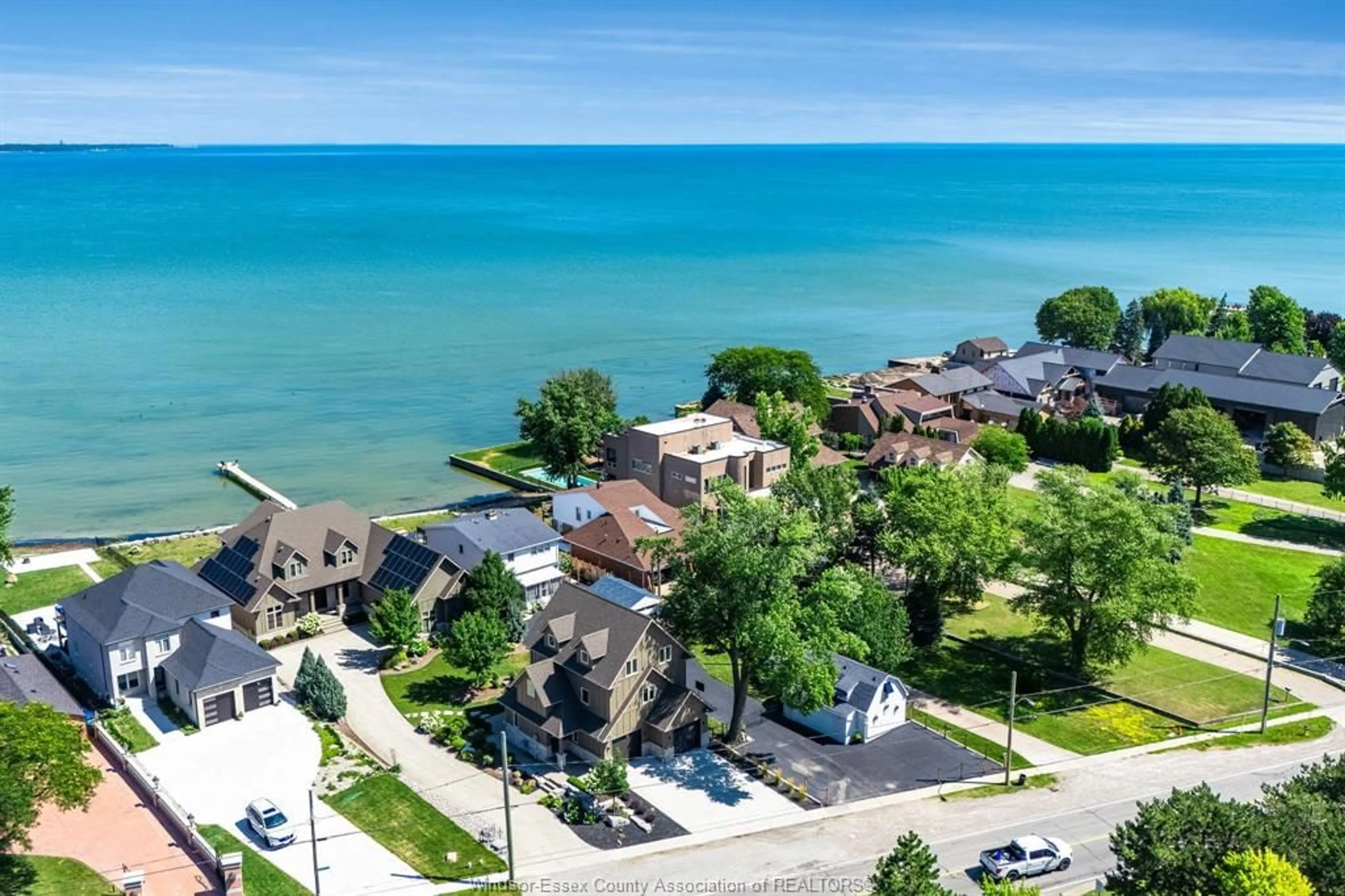A pic from outside/outdoor area/front of a property/back of a property/a pic from drone, water/lake/river/ocean view for 12086 RIVERSIDE Dr, Tecumseh Ontario N8P 1A9
