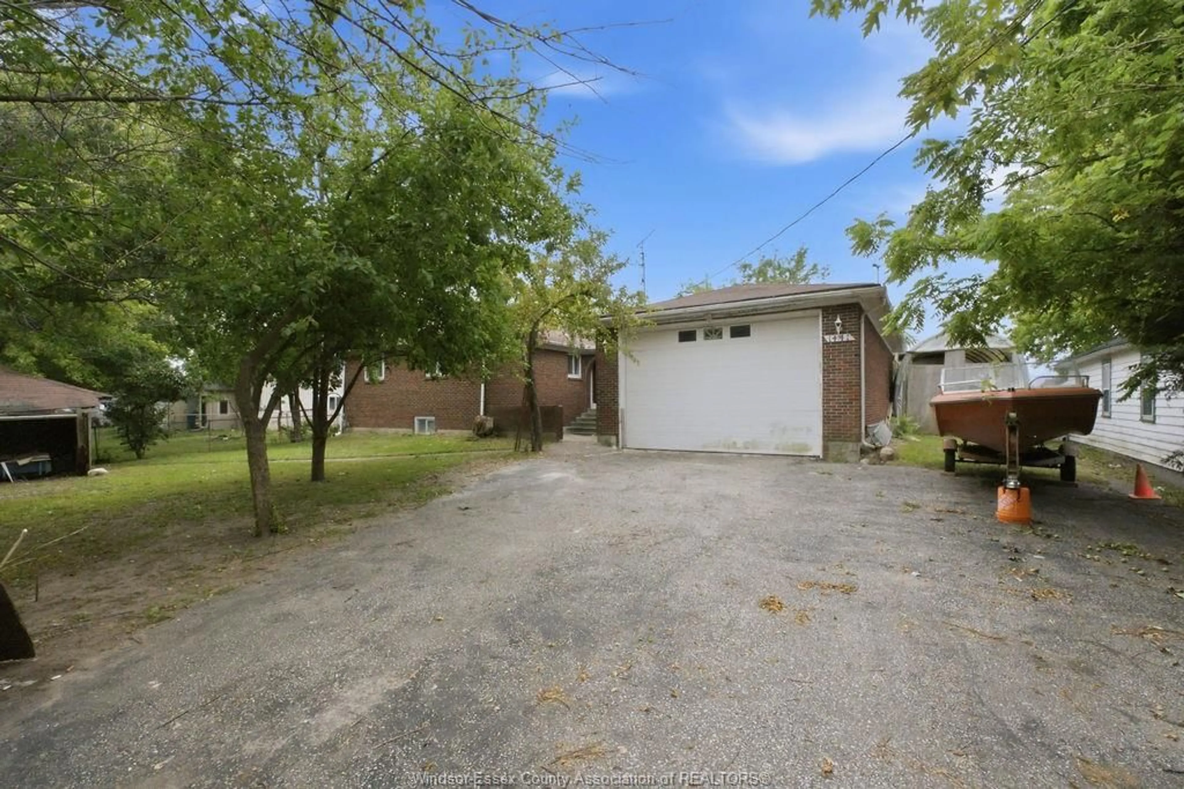 A pic from outside/outdoor area/front of a property/back of a property/a pic from drone, street for 1441 HERITAGE RD, Kingsville Ontario N9Y 2E6