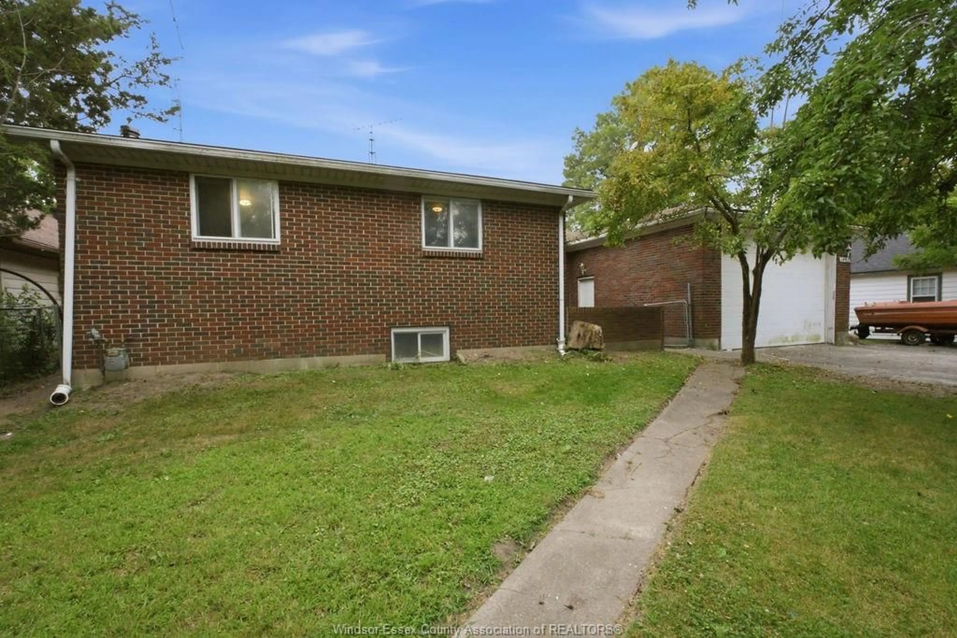 Home with brick exterior material, street for 1441 HERITAGE RD, Kingsville Ontario N9Y 2E6