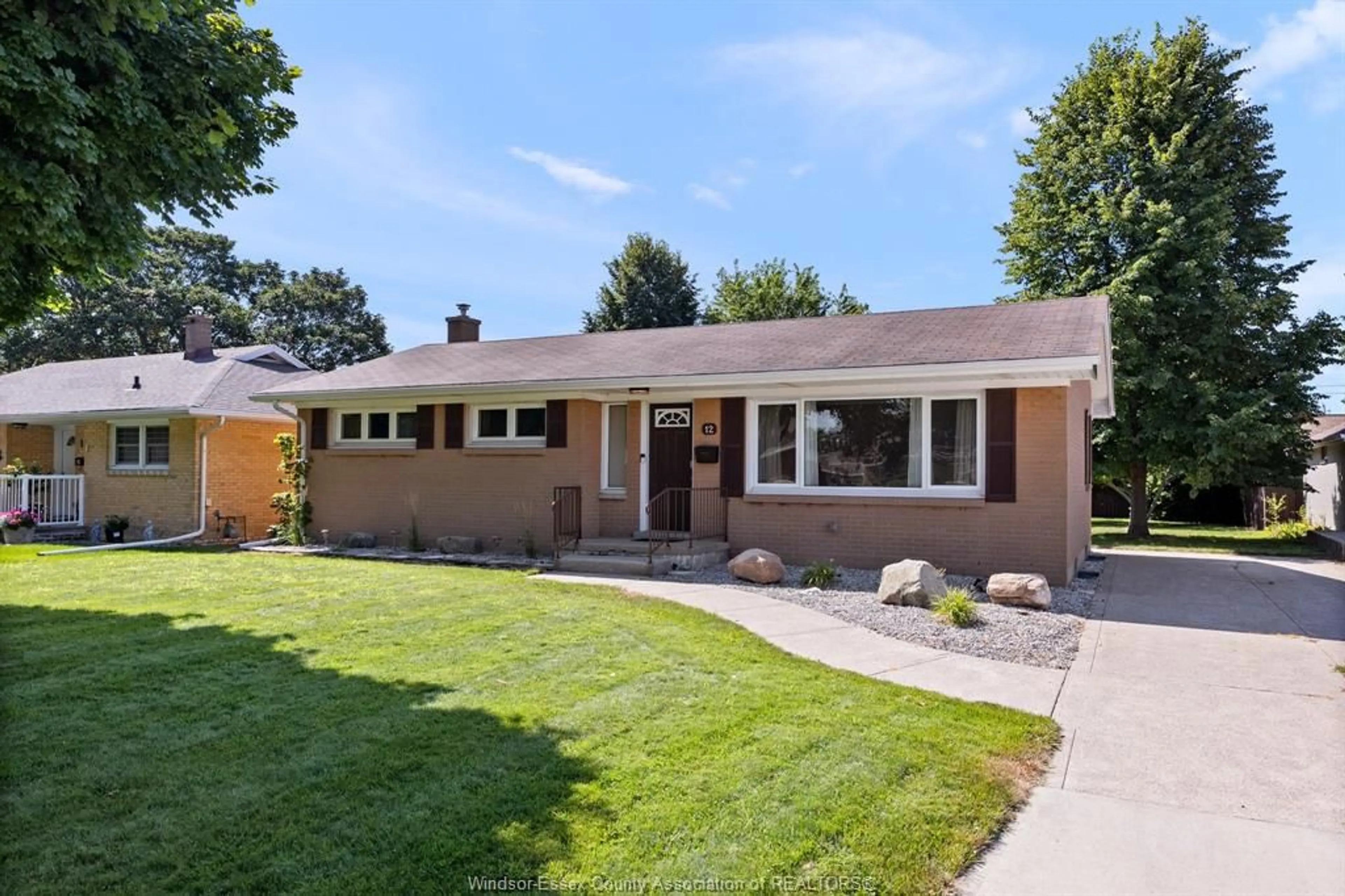 Home with brick exterior material, street for 12 GLADSTONE, Leamington Ontario N8H 2H5