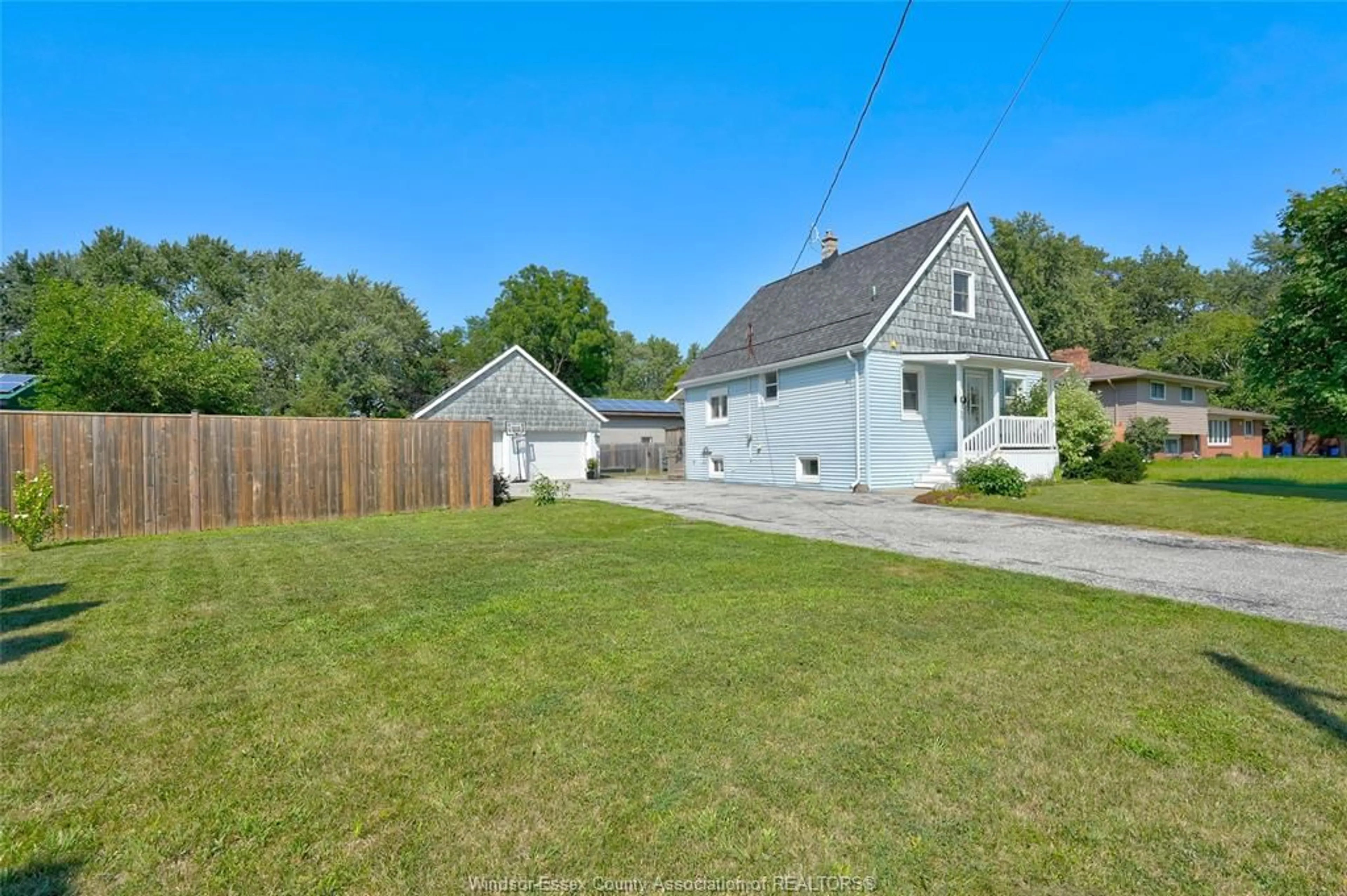 A pic from outside/outdoor area/front of a property/back of a property/a pic from drone, street for 360 HIGHWAY 18, LaSalle Ontario N9J 1A4