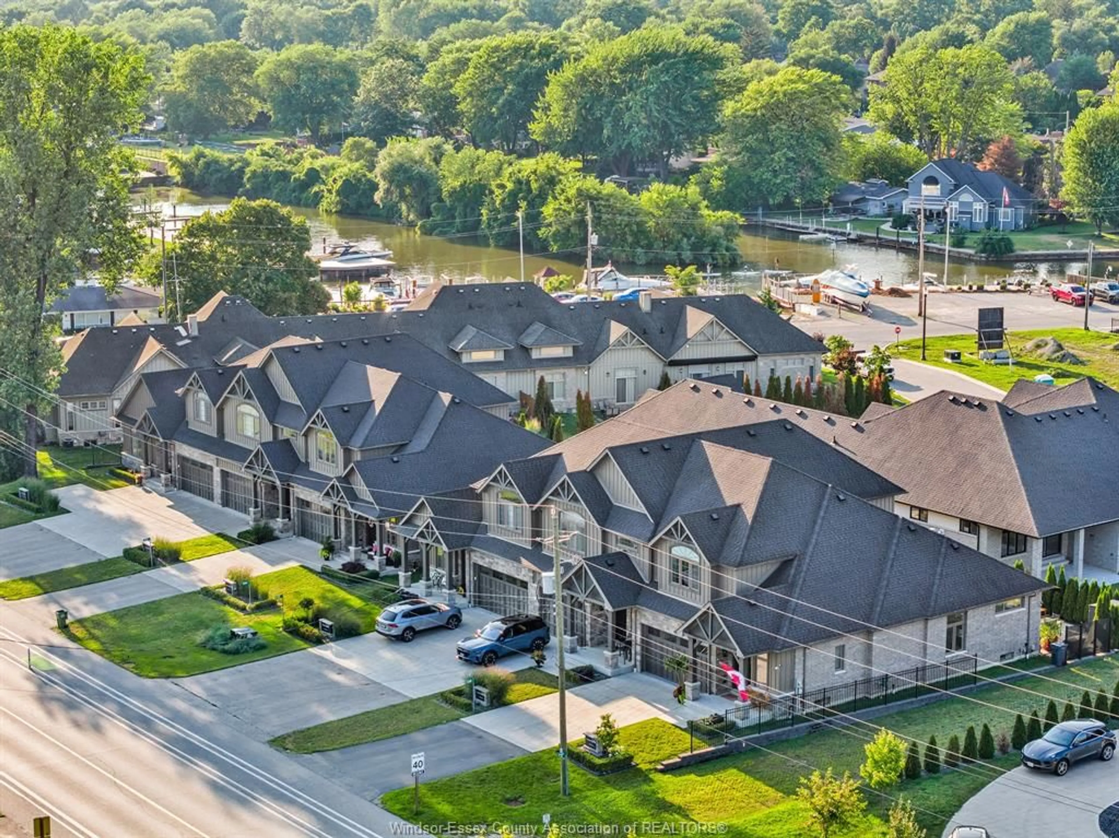 A pic from outside/outdoor area/front of a property/back of a property/a pic from drone, street for 240 OLD TECUMSEH Rd, Lakeshore Ontario N8N 3S7