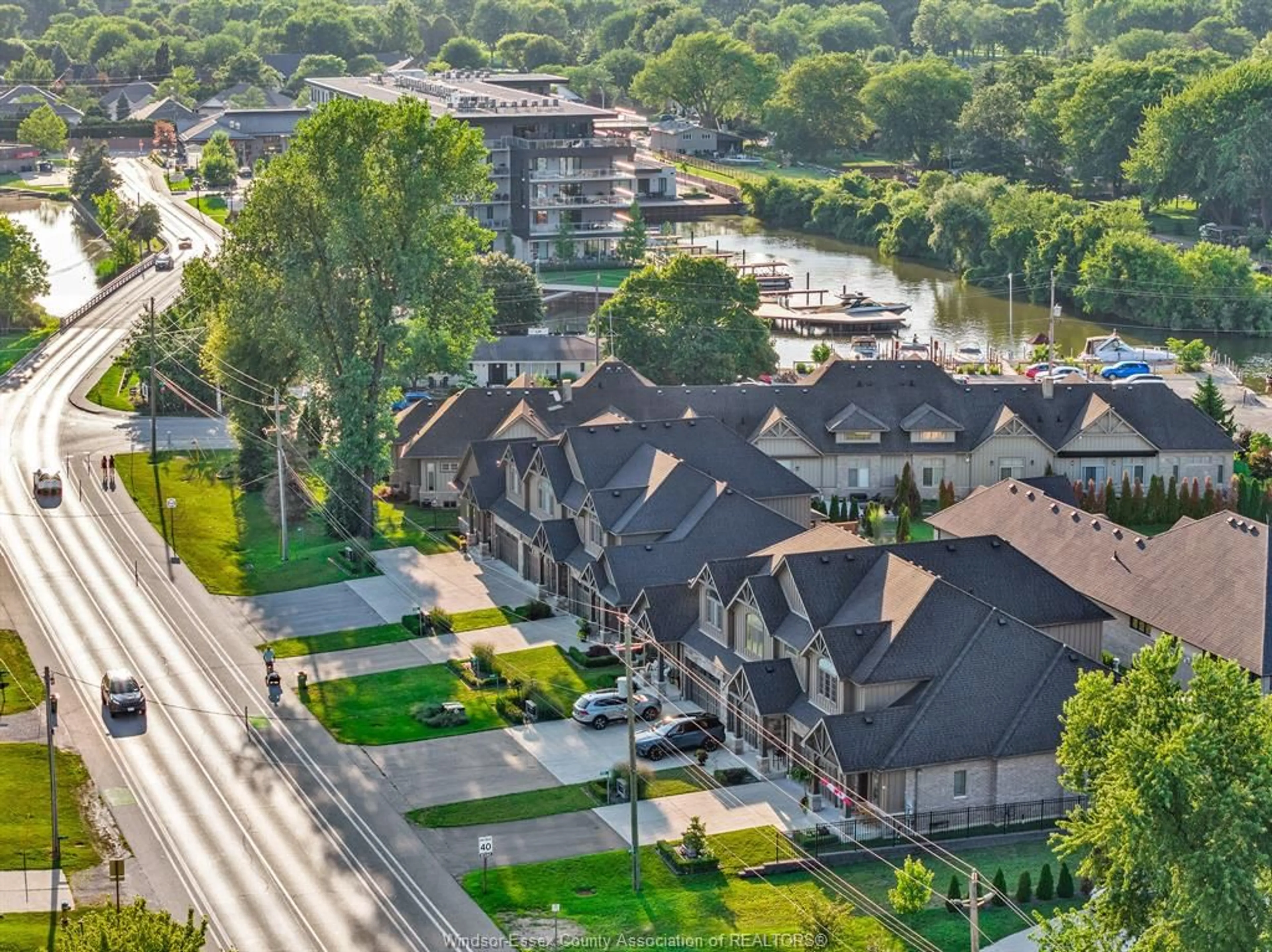 A pic from outside/outdoor area/front of a property/back of a property/a pic from drone, city buildings view from balcony for 240 OLD TECUMSEH Rd, Lakeshore Ontario N8N 3S7