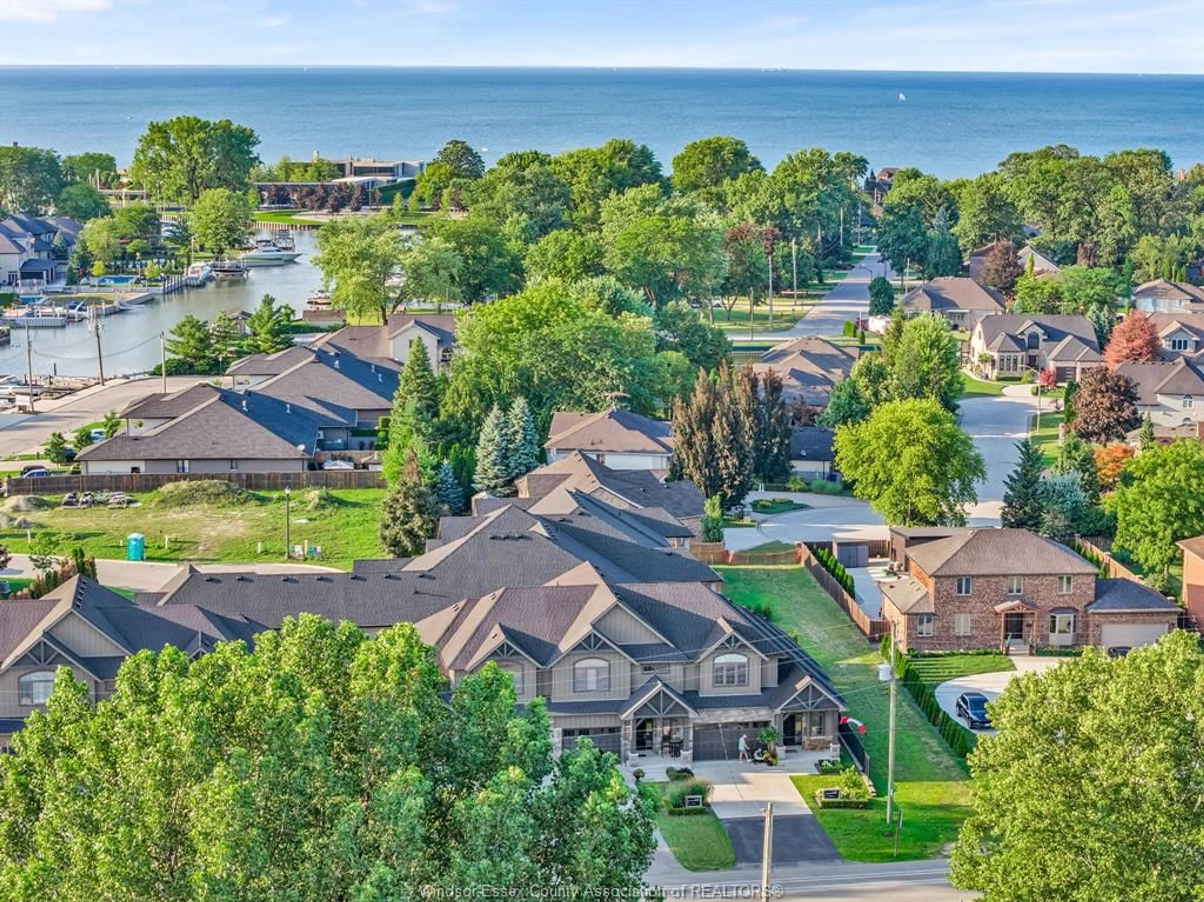 A pic from outside/outdoor area/front of a property/back of a property/a pic from drone, water/lake/river/ocean view for 240 OLD TECUMSEH Rd, Lakeshore Ontario N8N 3S7