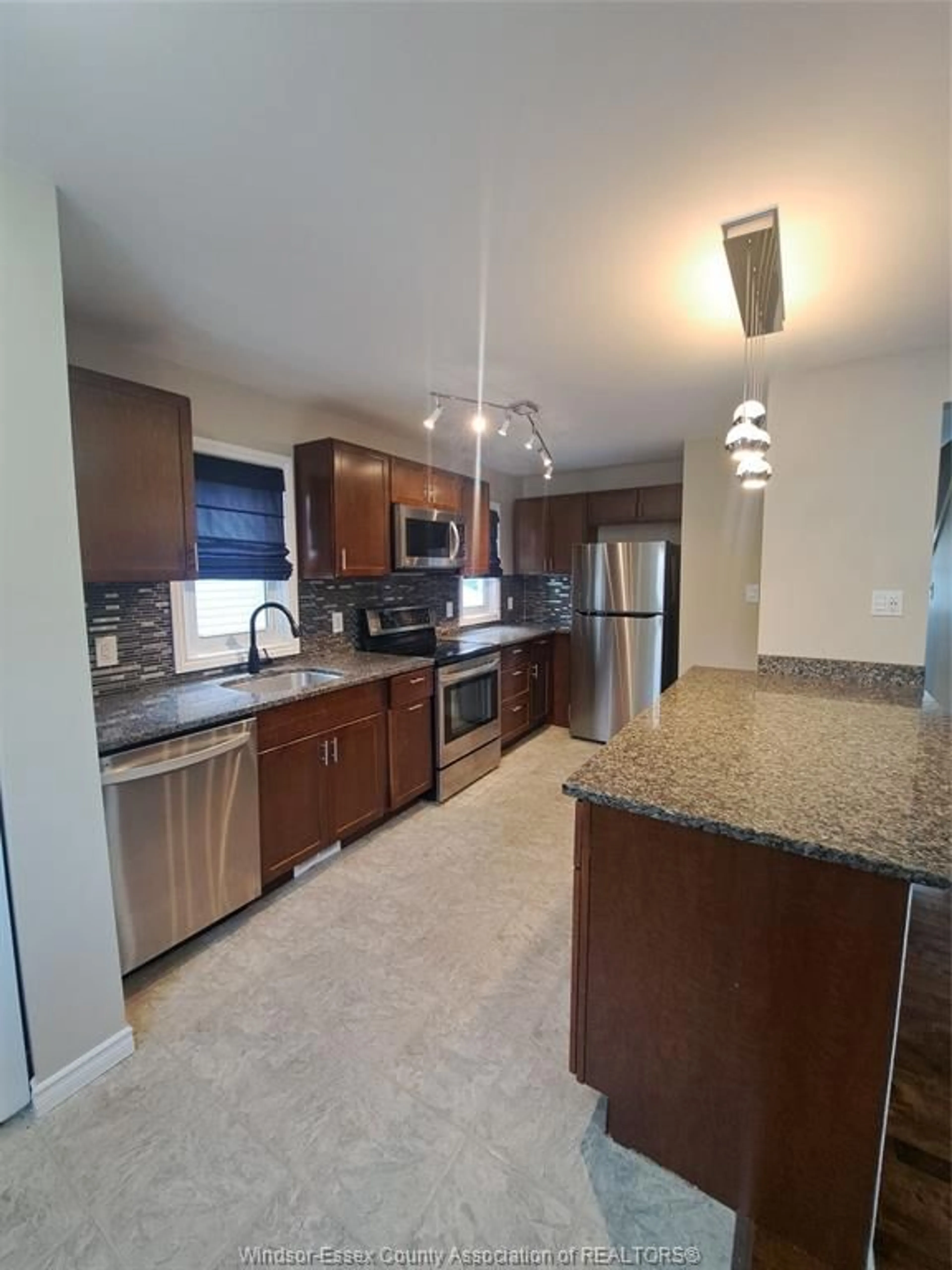 Open concept kitchen, ceramic/tile floor for 1953 FRANCOIS Rd, Windsor Ontario N8W 4S9