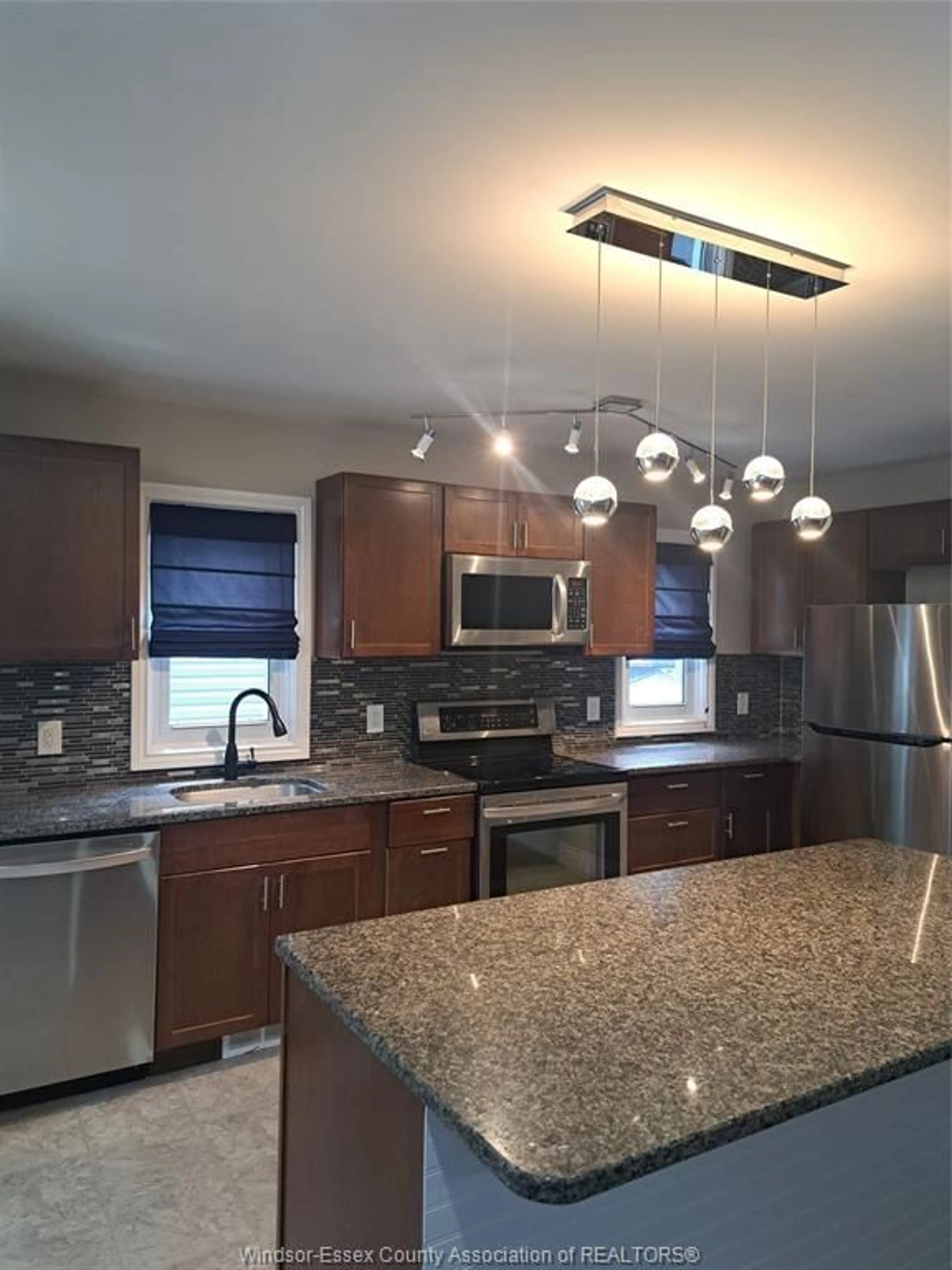 Open concept kitchen, ceramic/tile floor for 1953 FRANCOIS Rd, Windsor Ontario N8W 4S9