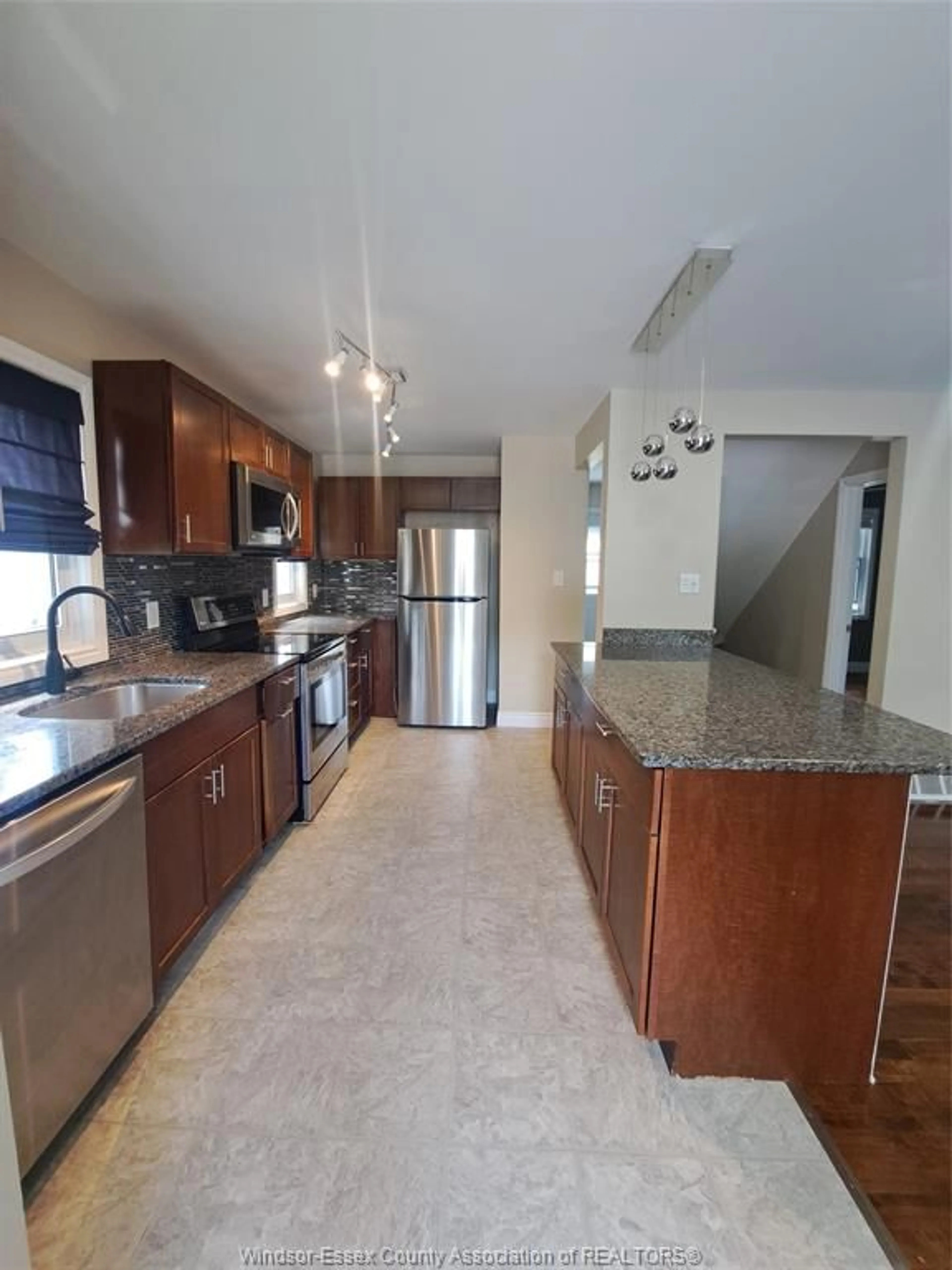 Open concept kitchen, ceramic/tile floor for 1953 FRANCOIS Rd, Windsor Ontario N8W 4S9