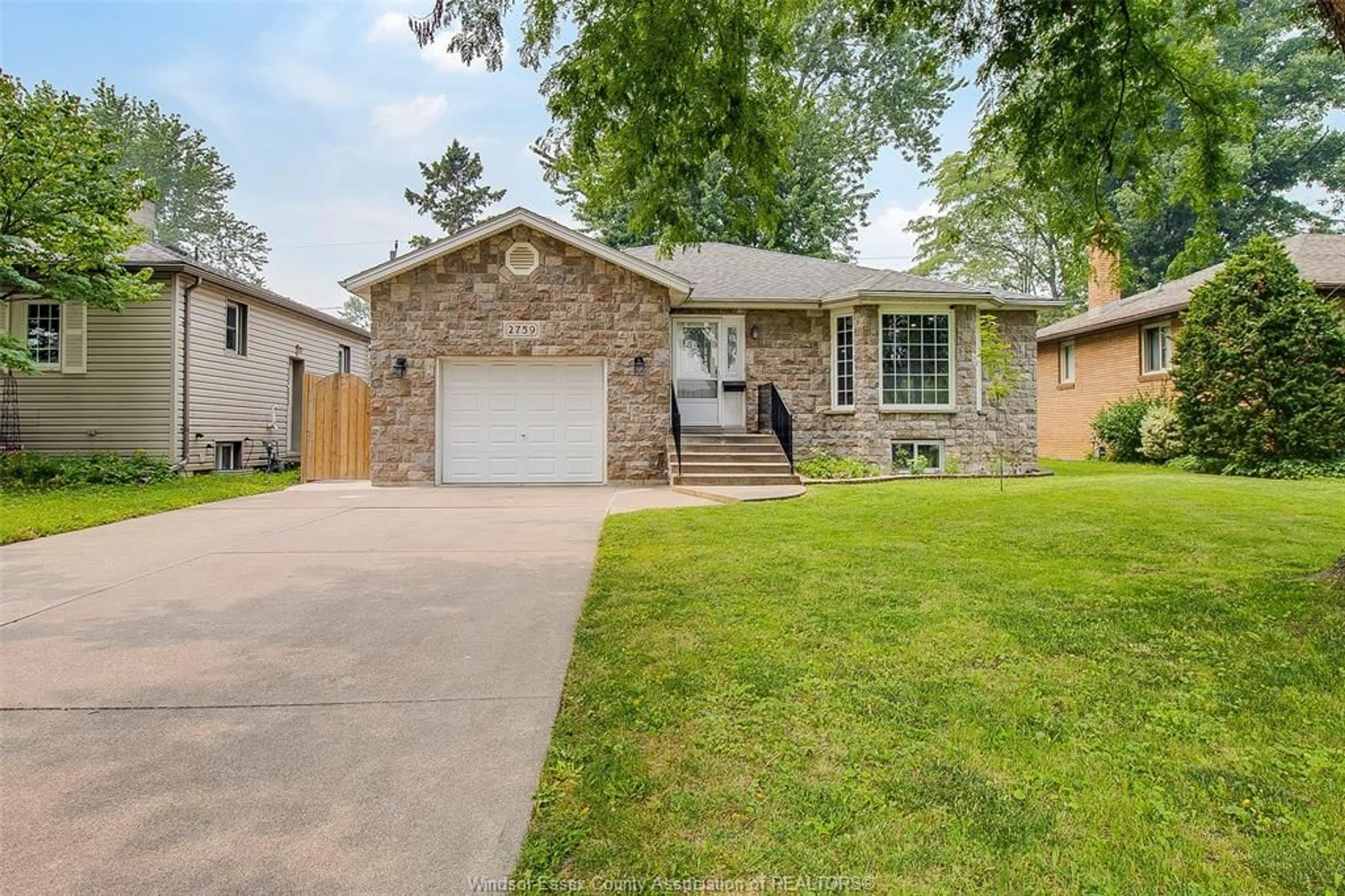 Home with brick exterior material, street for 2759 MCKAY Ave, Windsor Ontario N9E 2P7
