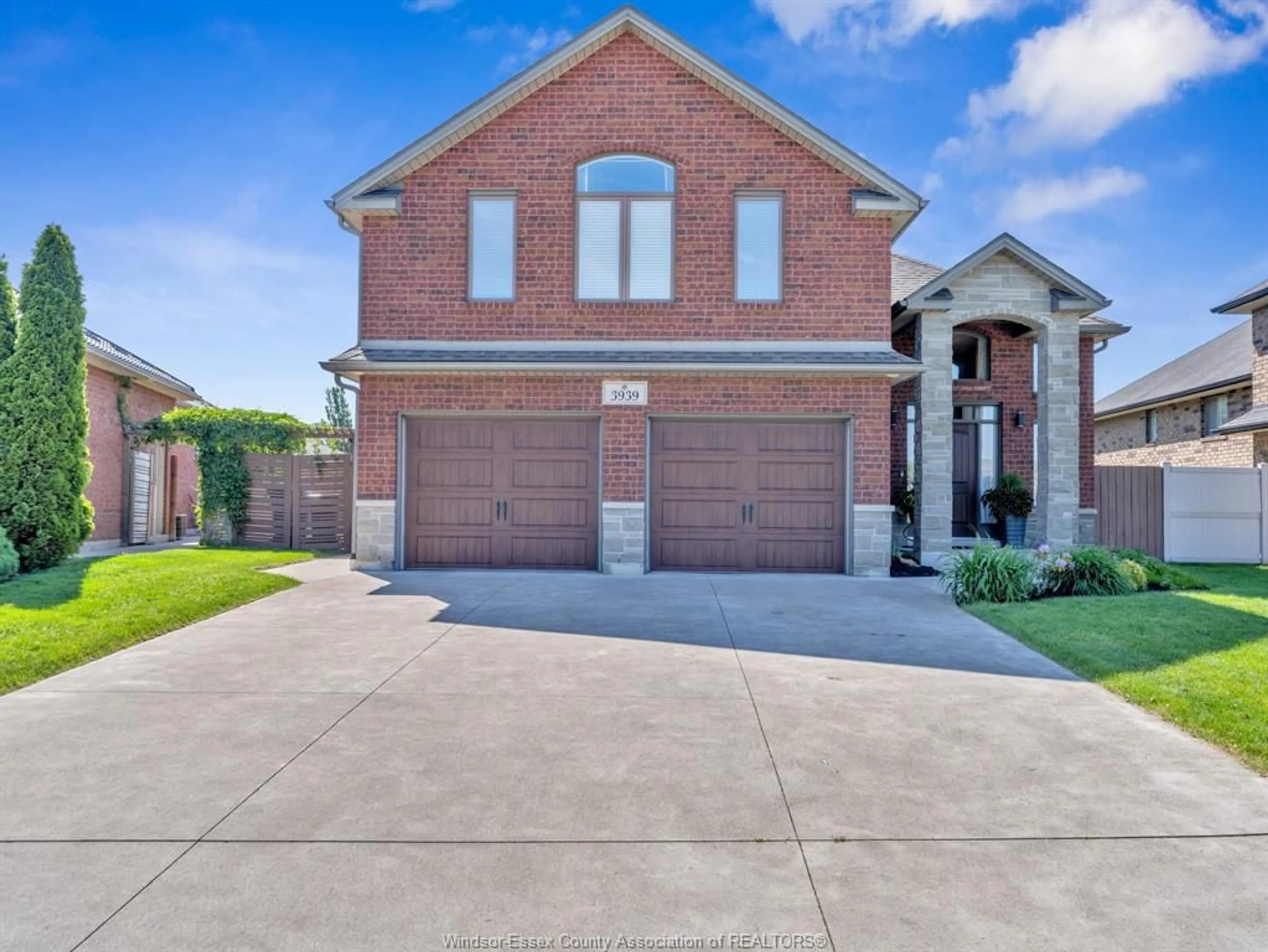 Home with brick exterior material, street for 3939 WILDWOOD Dr, Windsor Ontario N8R 2L4