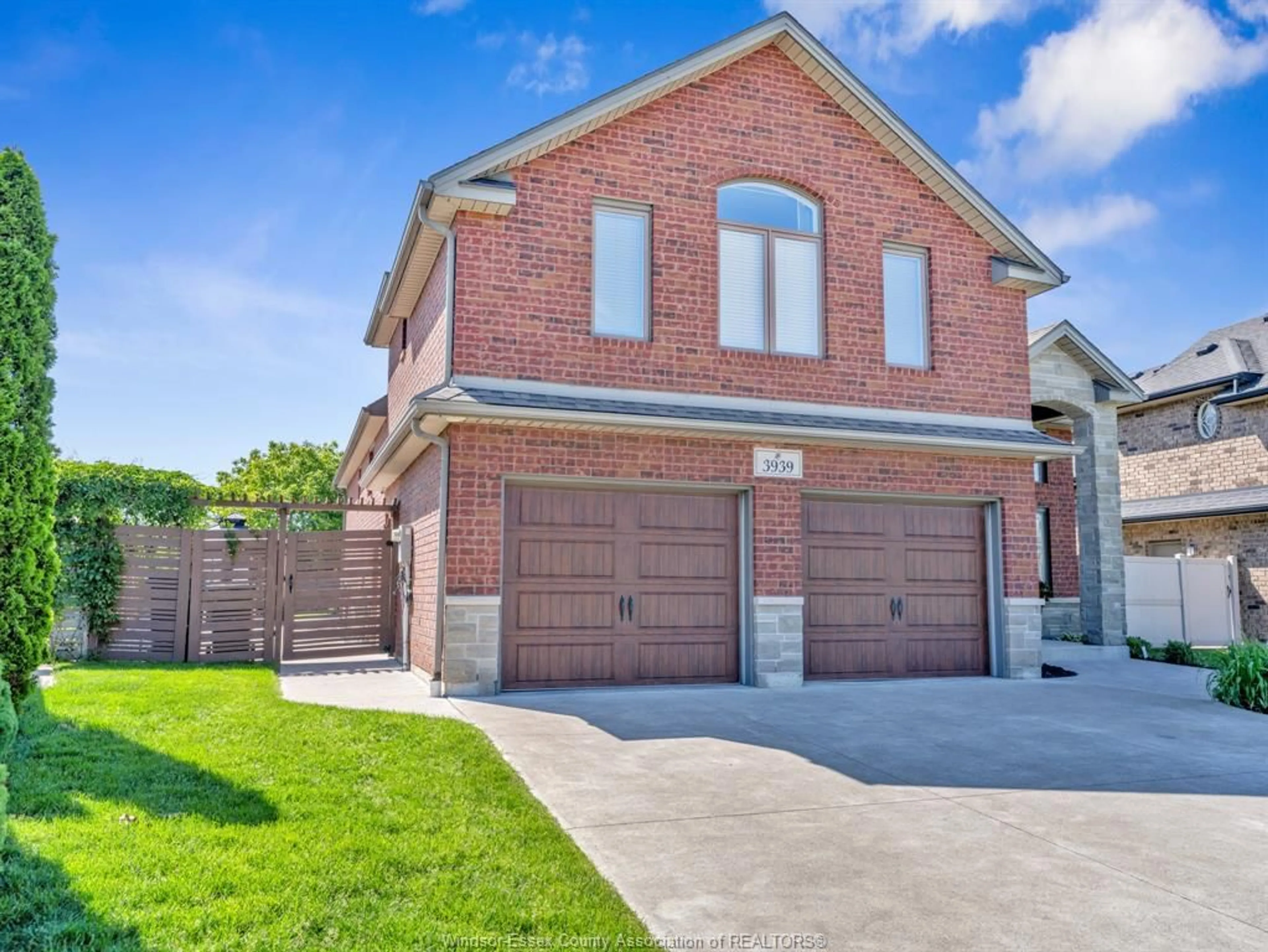 Home with brick exterior material, street for 3939 WILDWOOD Dr, Windsor Ontario N8R 2L4