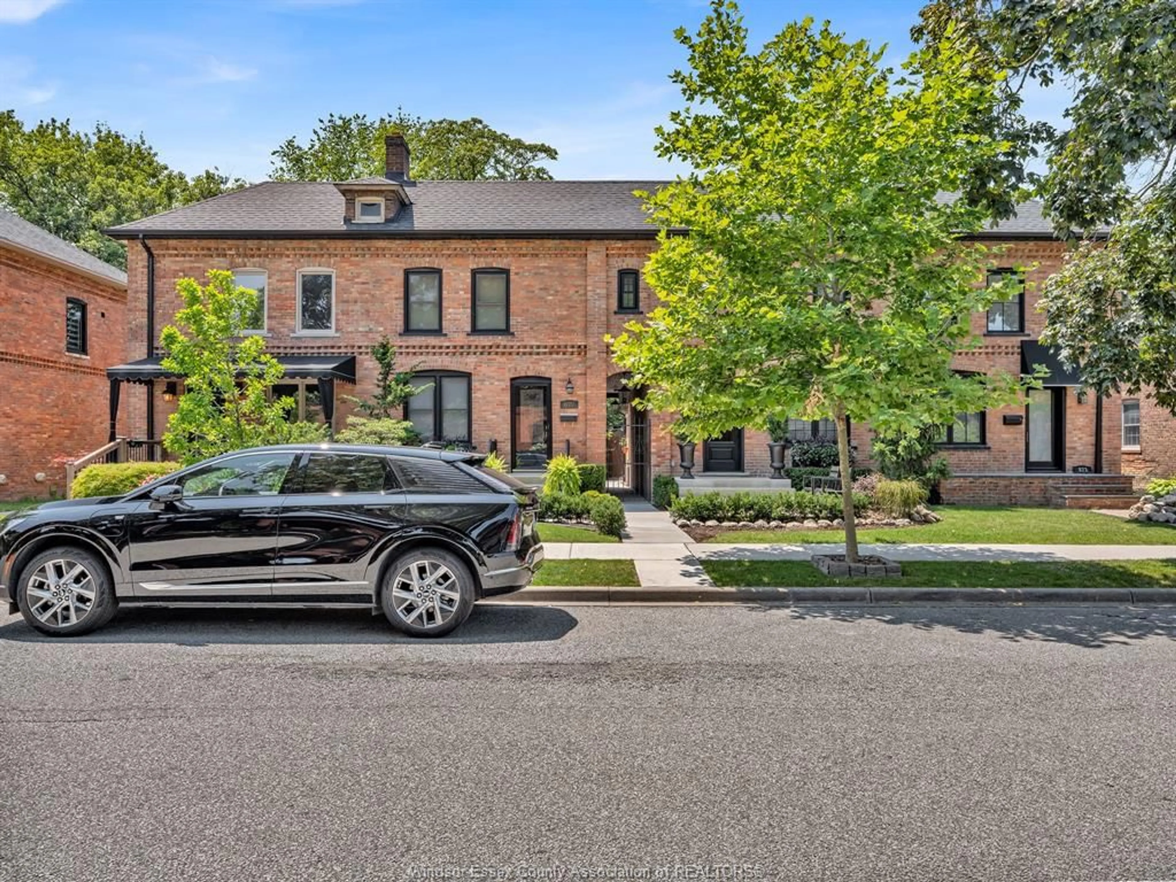 Home with brick exterior material, street for 883 MONMOUTH Rd, Windsor Ontario N8Y 3L5