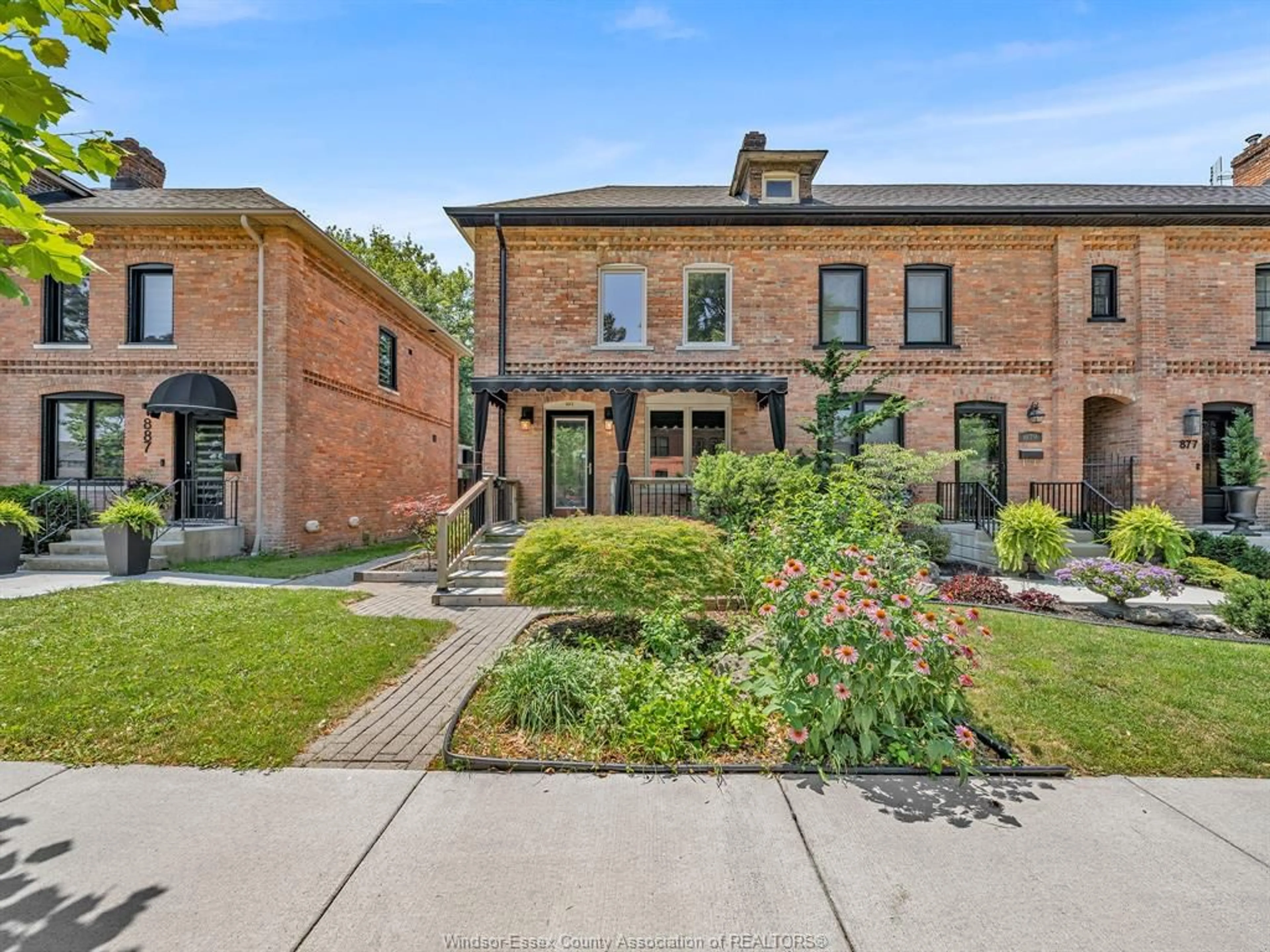 Home with brick exterior material, street for 883 MONMOUTH Rd, Windsor Ontario N8Y 3L5
