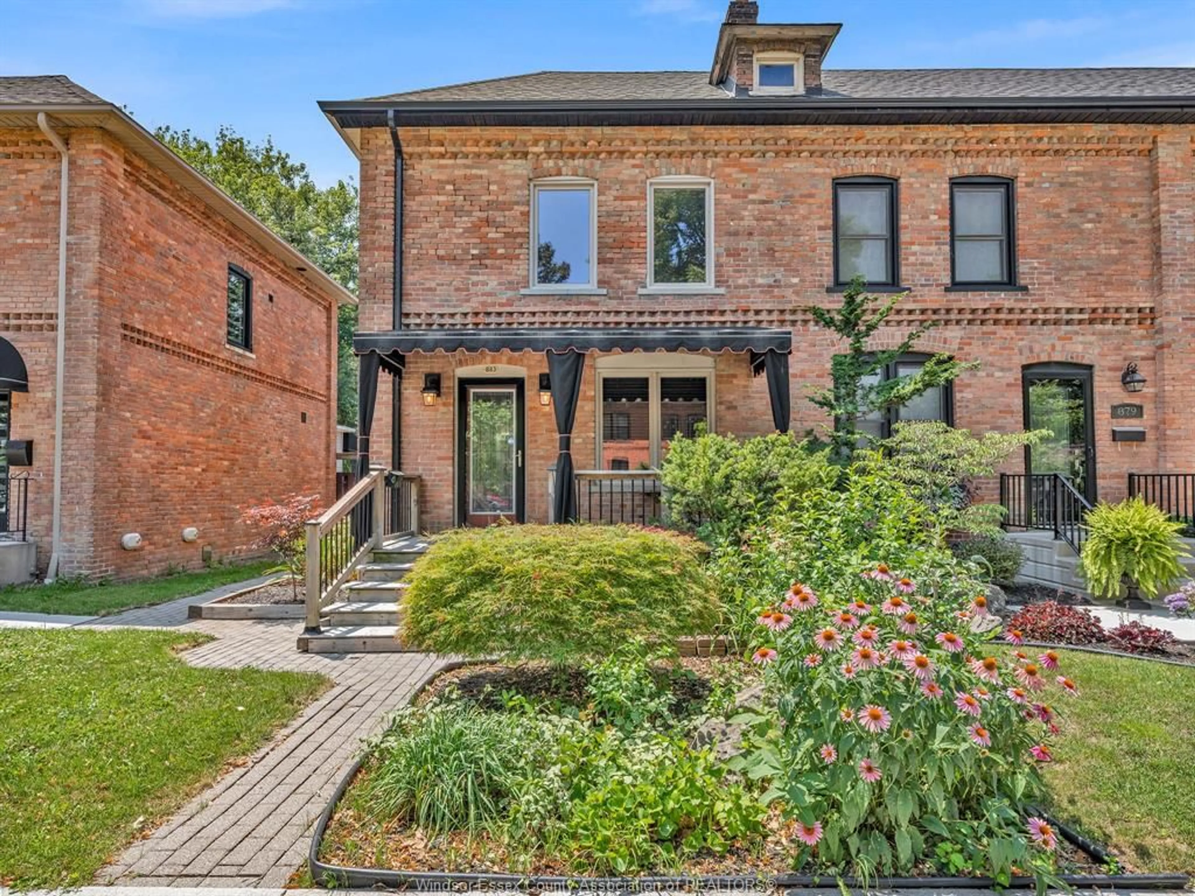 Home with brick exterior material, street for 883 MONMOUTH Rd, Windsor Ontario N8Y 3L5