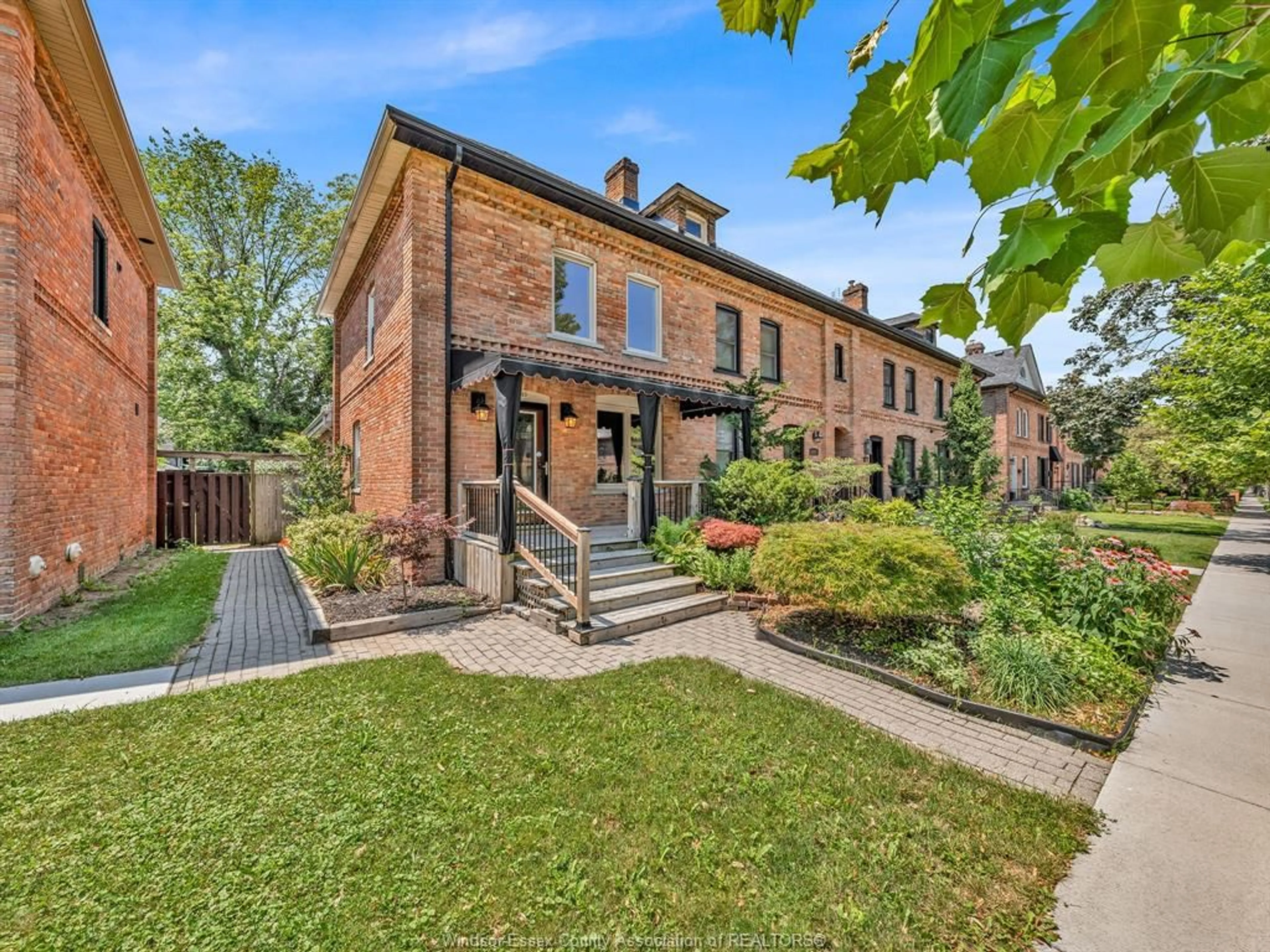 Home with brick exterior material, street for 883 MONMOUTH Rd, Windsor Ontario N8Y 3L5