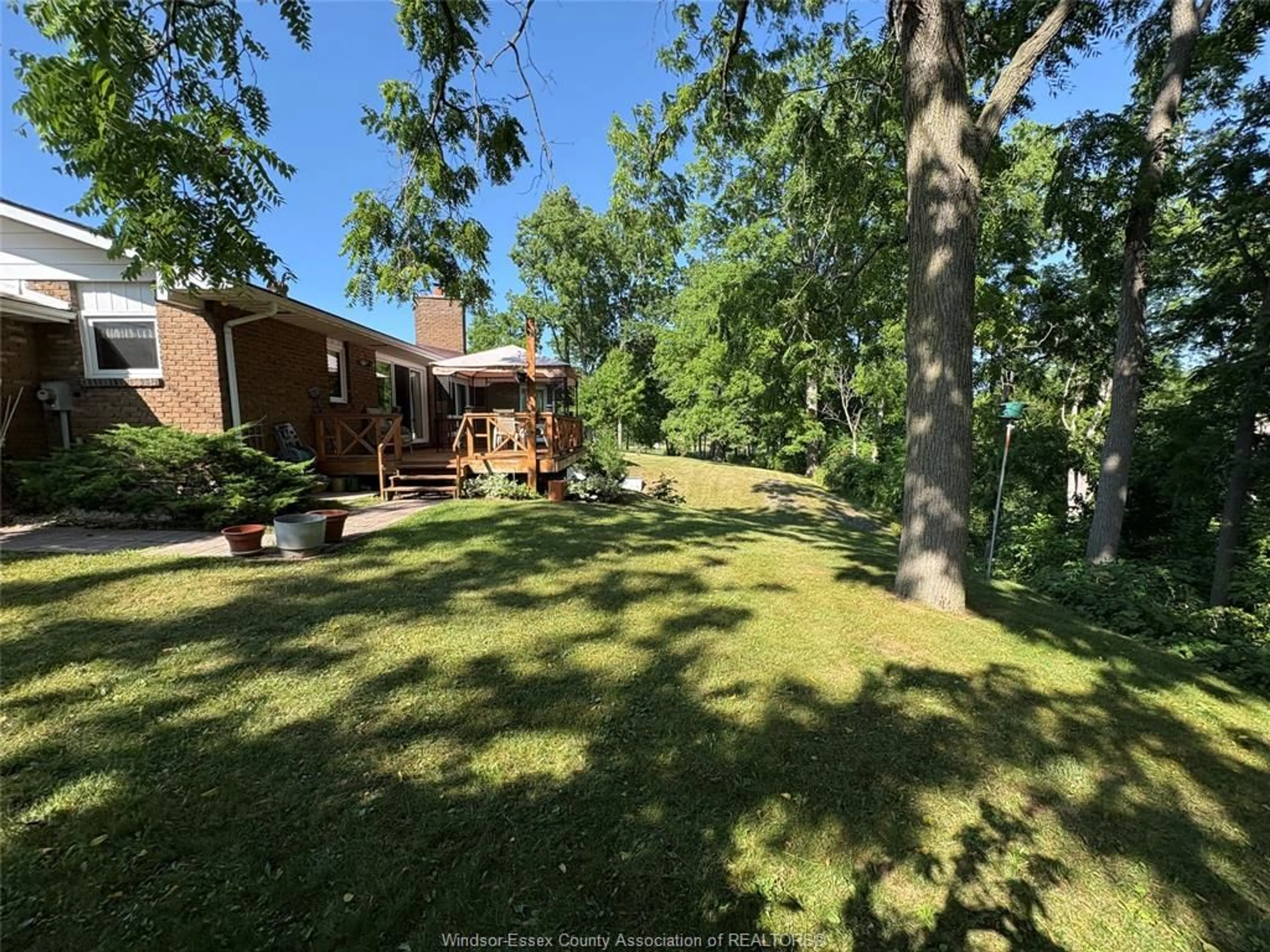 A pic from outside/outdoor area/front of a property/back of a property/a pic from drone, forest/trees view for 37 PARK Lane, Lambton Shores Ontario N0N 1J0