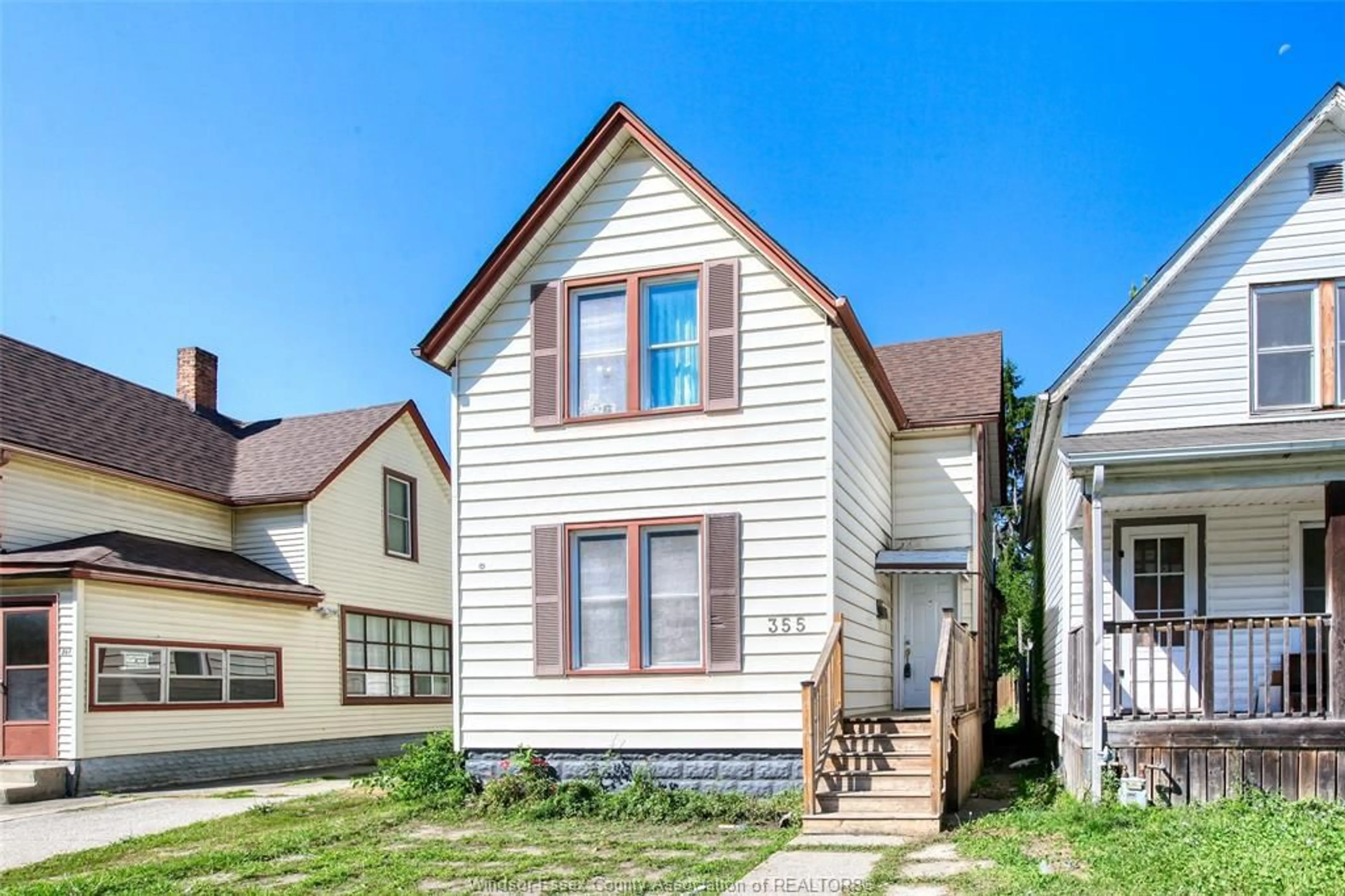 Home with vinyl exterior material, street for 355 BRIDGE, Windsor Ontario N9B 2M3