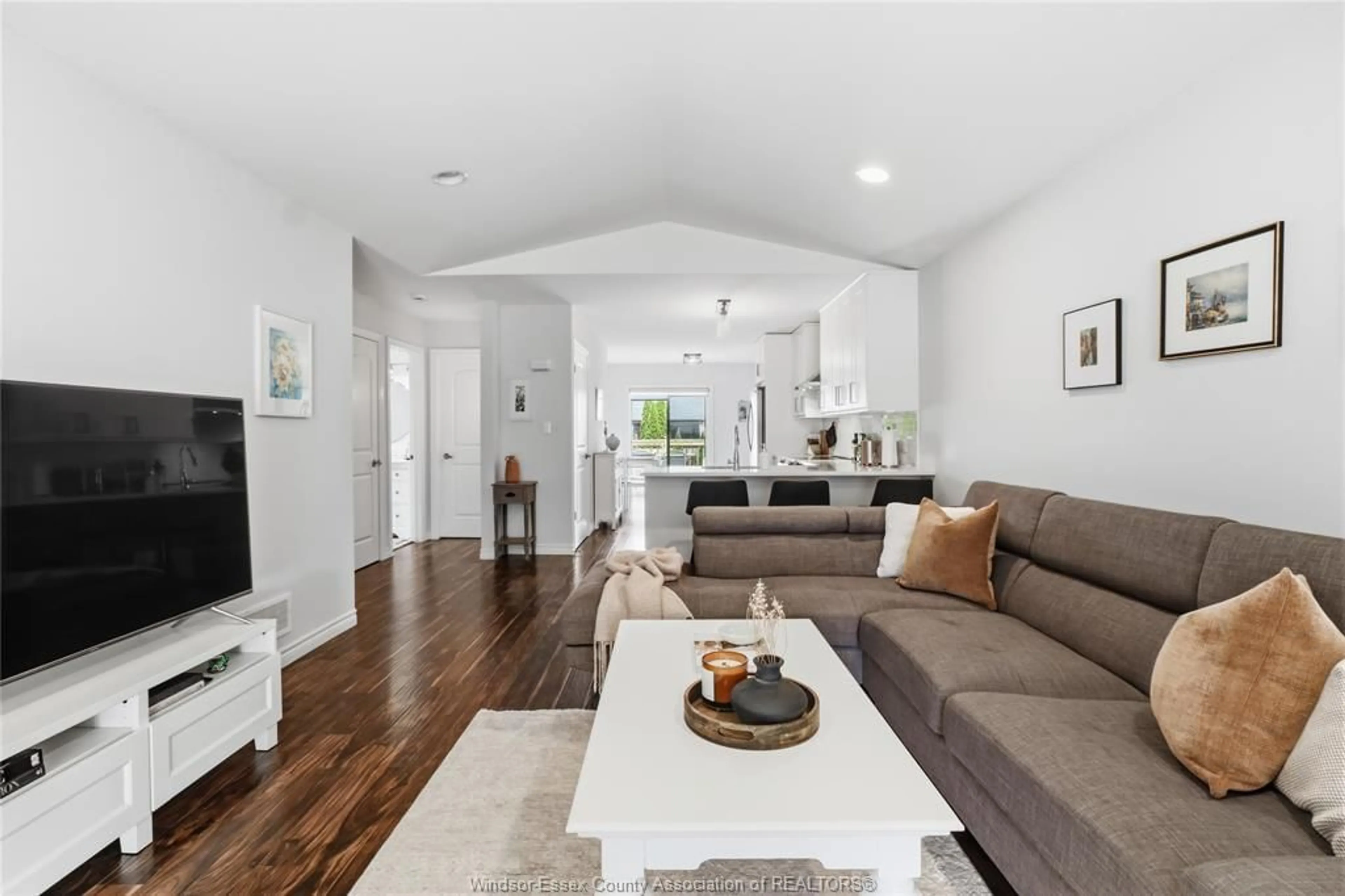 Living room with furniture, wood/laminate floor for 3222 SEVILLE Ave, Windsor Ontario N8N 0A4