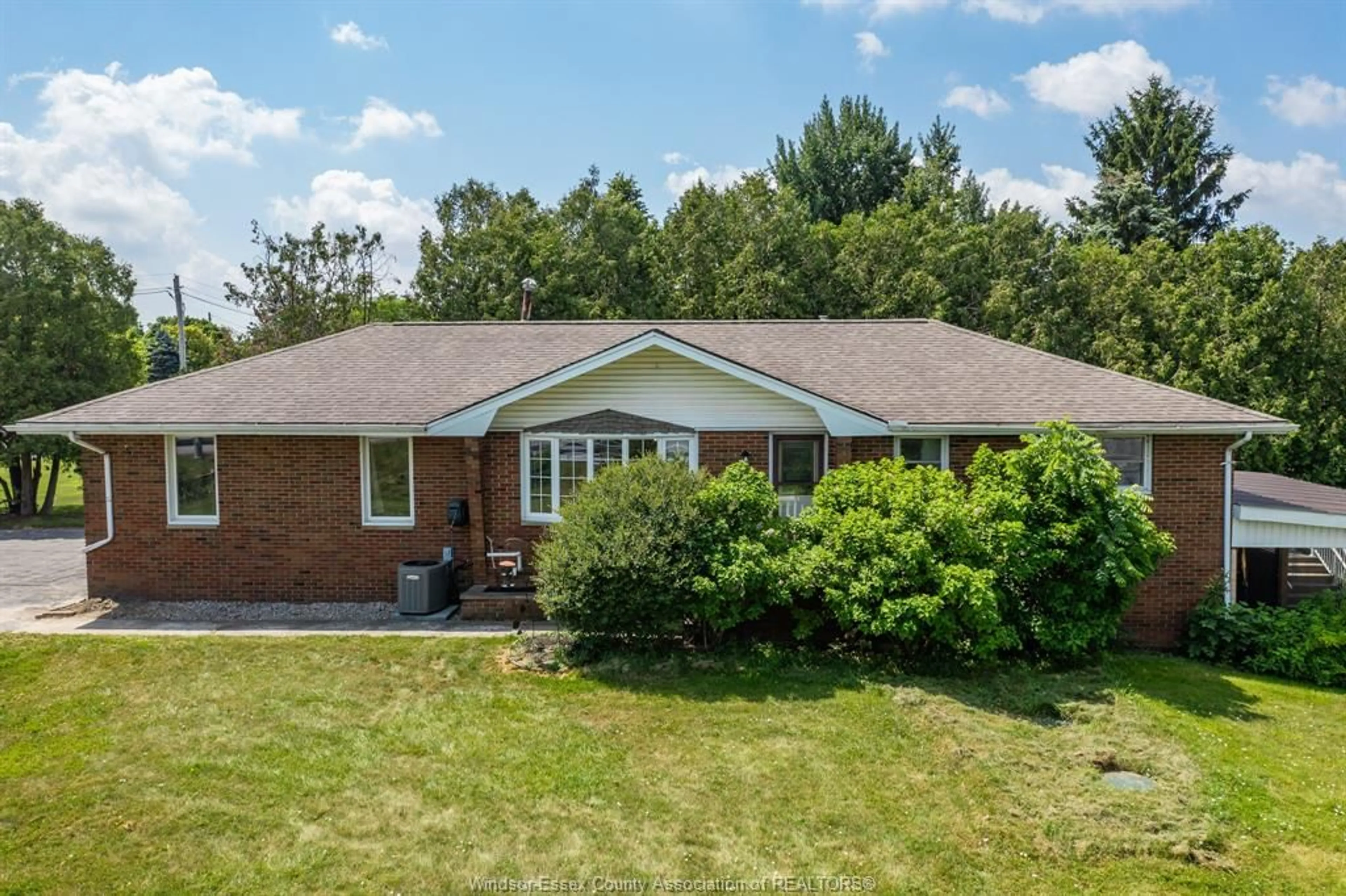 A pic from outside/outdoor area/front of a property/back of a property/a pic from drone, unknown for 1203 COUNTY ROAD 27, Lakeshore Ontario N8L 1B7