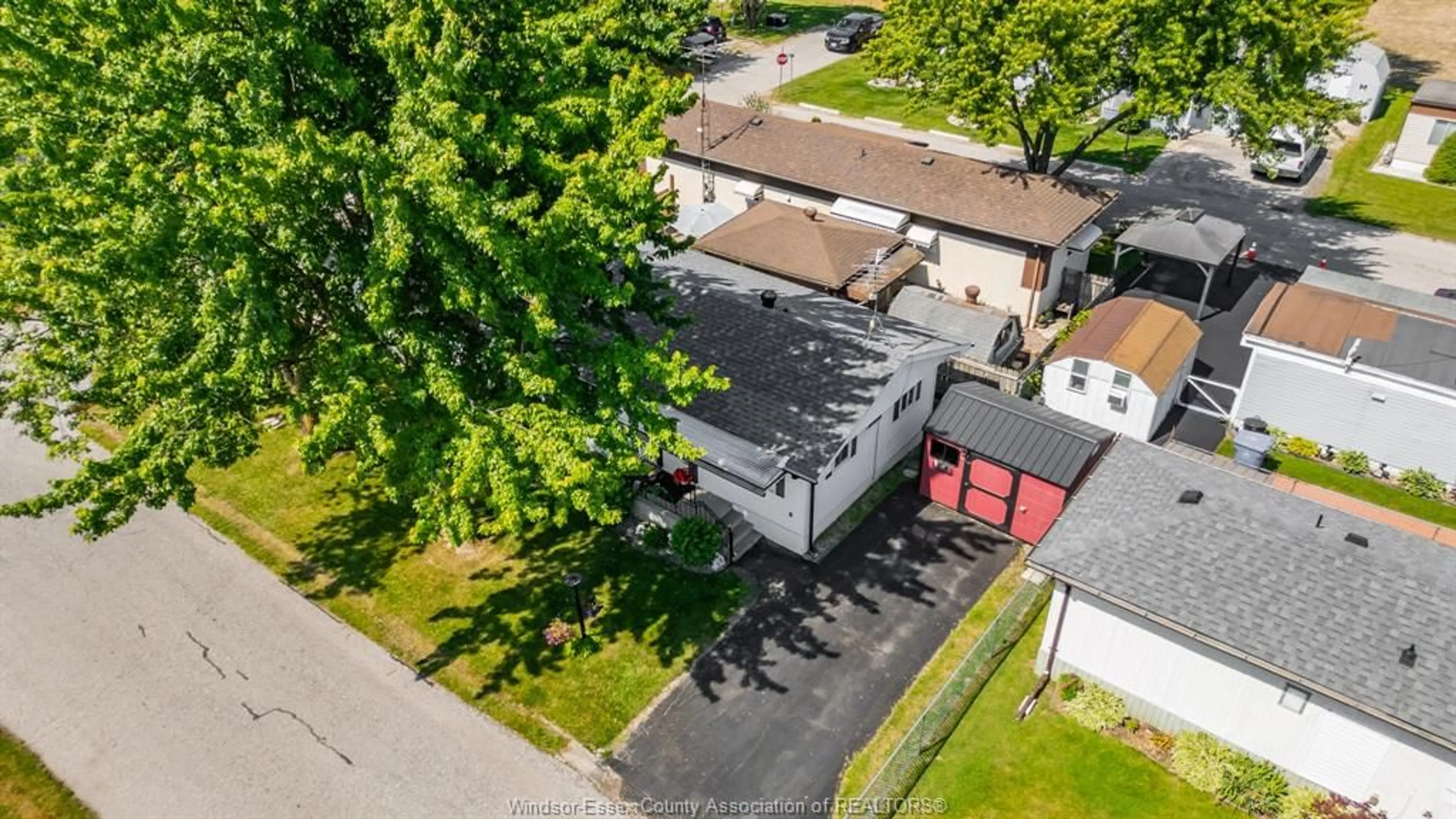 A pic from outside/outdoor area/front of a property/back of a property/a pic from drone, street for 110 BROOKS Blvd, Lakeshore Ontario N8N 2P8