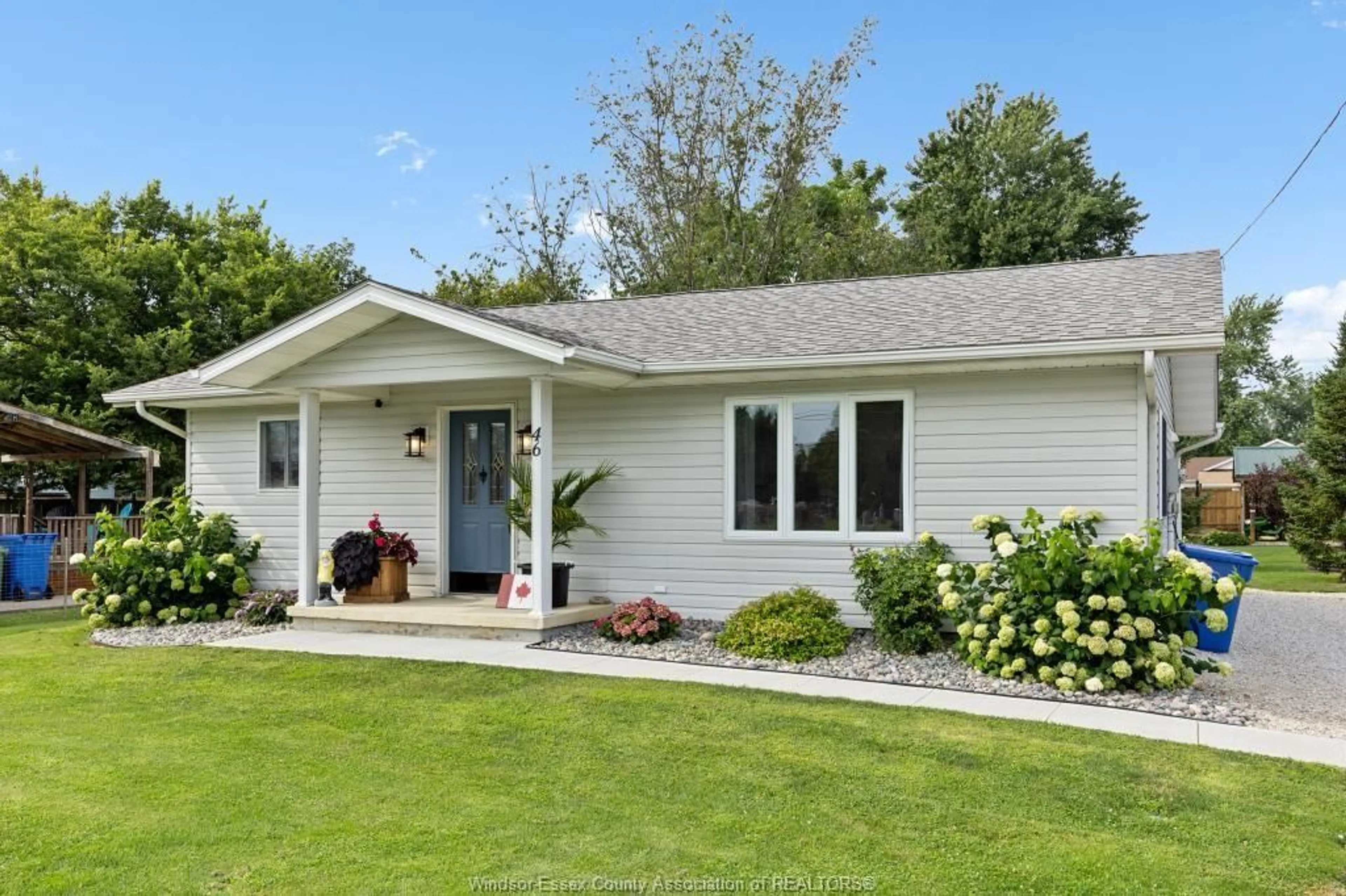 Home with vinyl exterior material, street for 46 COUNTY ROAD 50, Colchester Ontario N0R 1G0