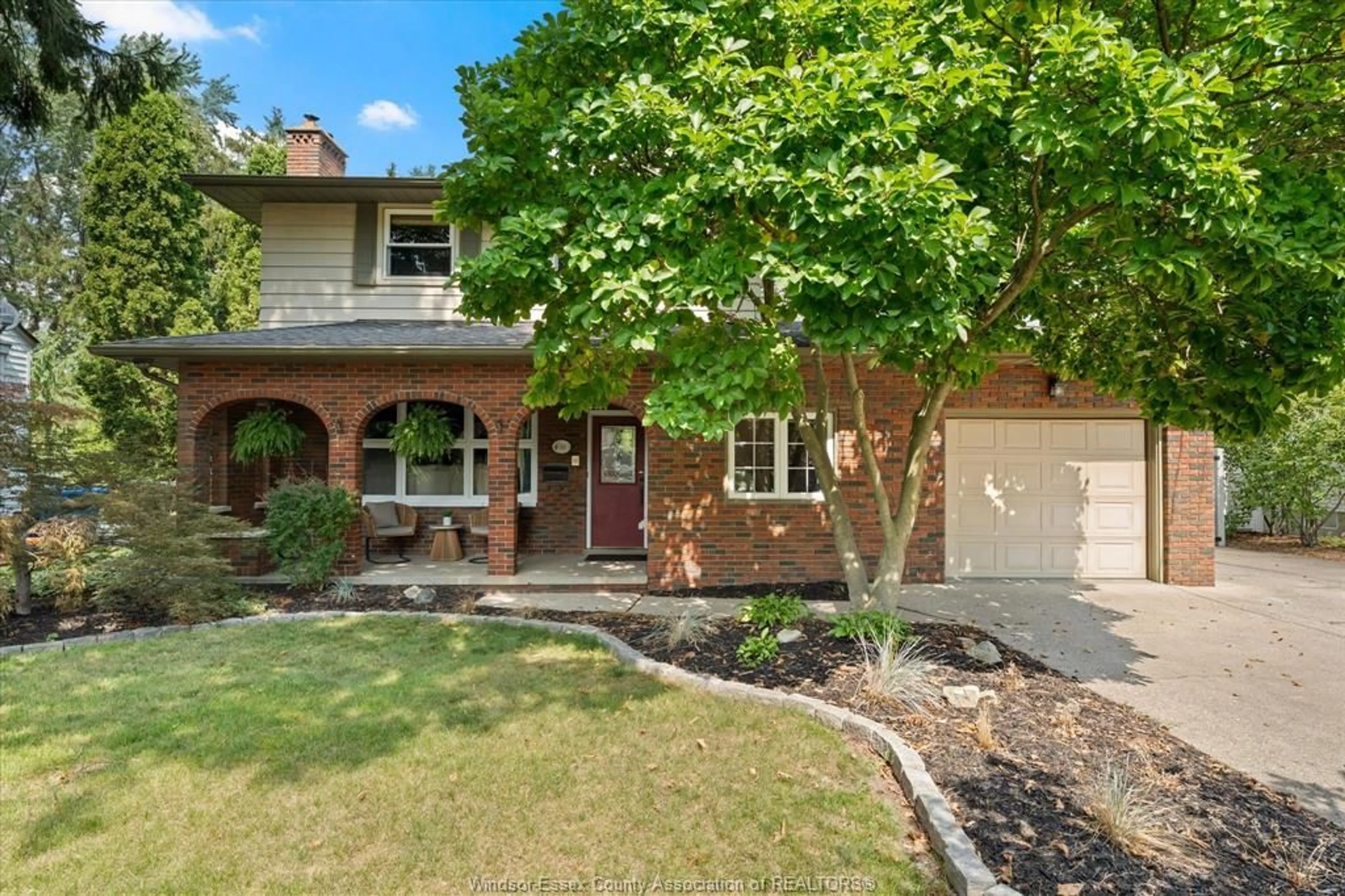 Home with brick exterior material, street for 4060 KENNEDY Dr, Windsor Ontario N9G 1X8
