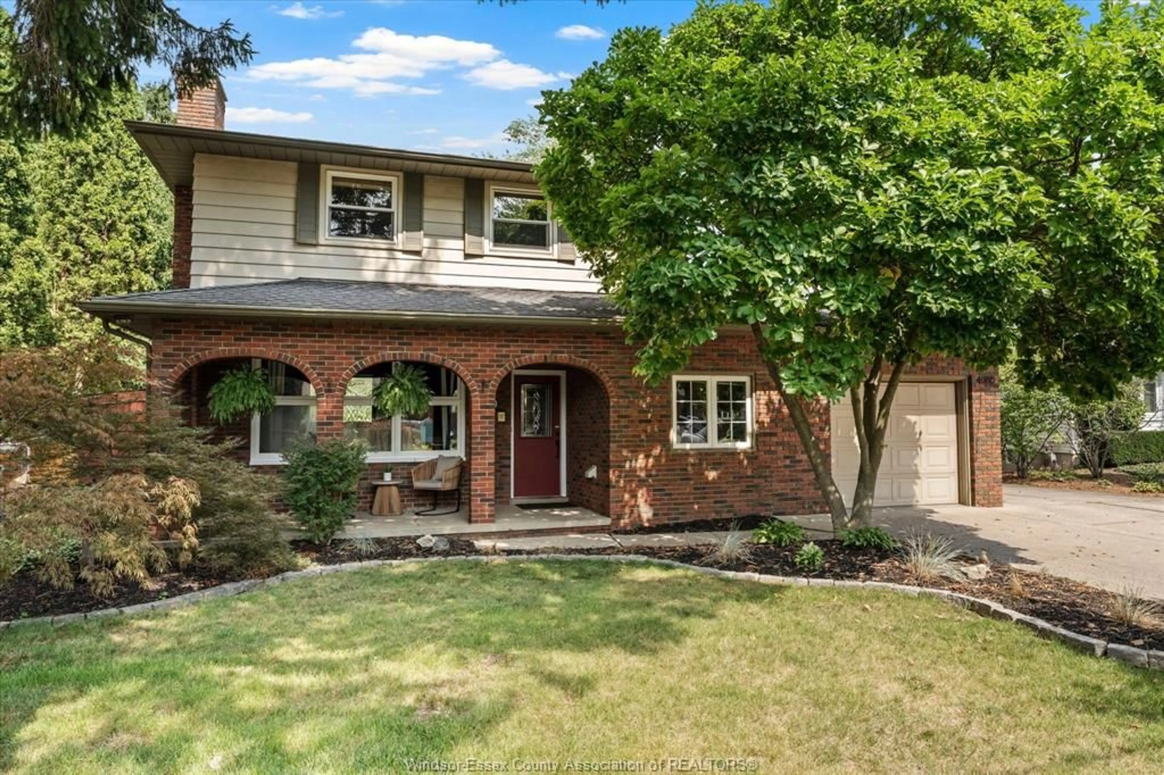 Home with brick exterior material, street for 4060 KENNEDY Dr, Windsor Ontario N9G 1X8