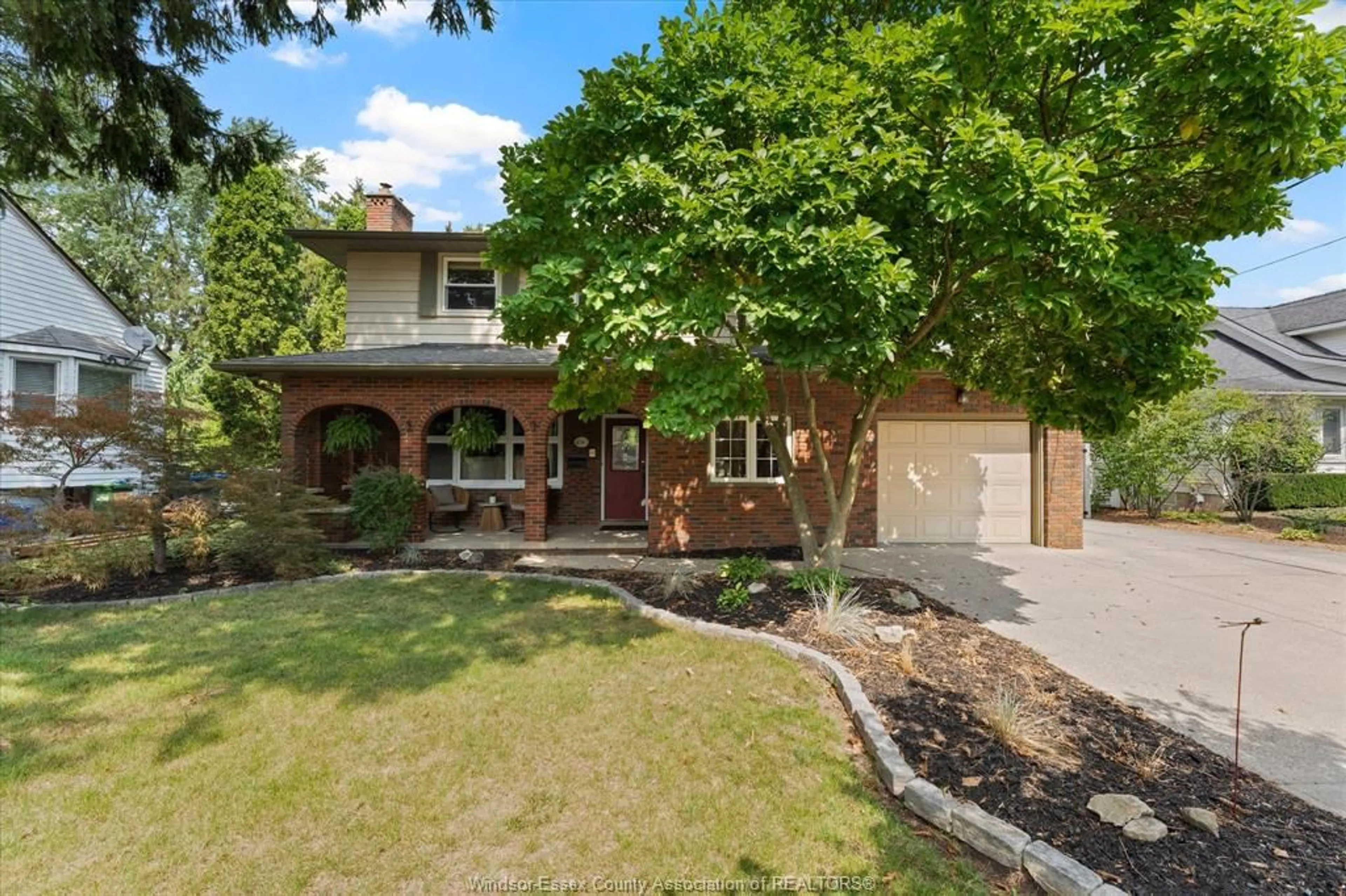 Home with brick exterior material, street for 4060 KENNEDY Dr, Windsor Ontario N9G 1X8