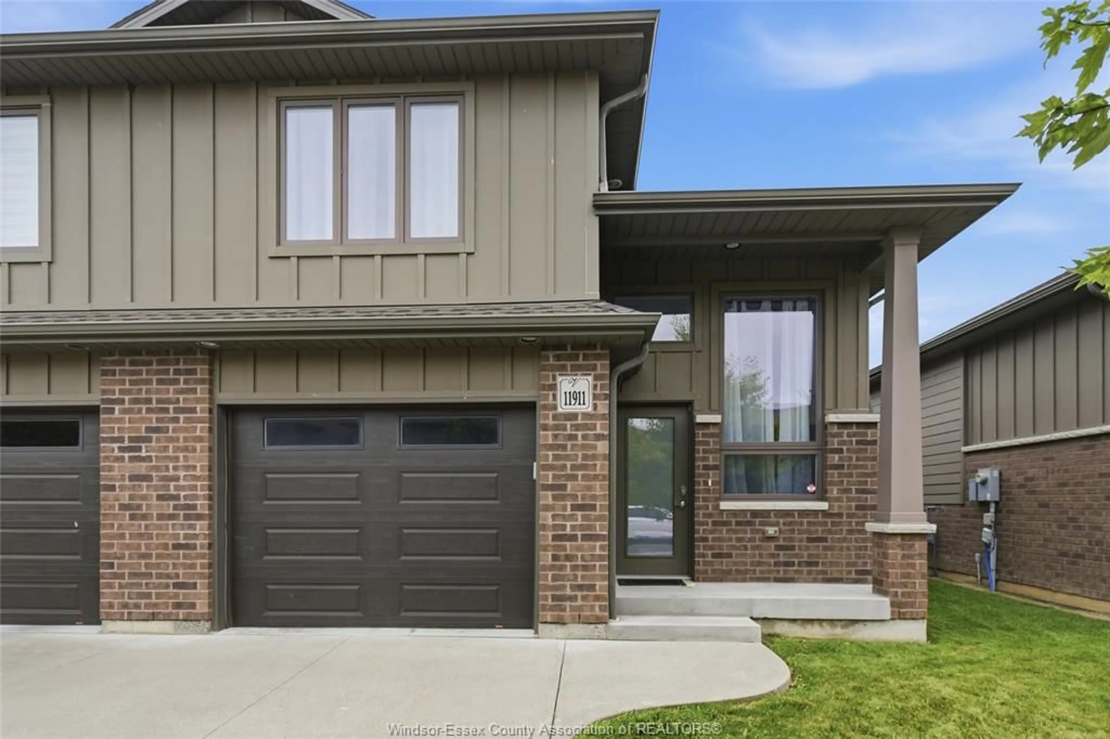Home with brick exterior material, street for 11911 MAITLAND Ave, Windsor Ontario N8P 0B9