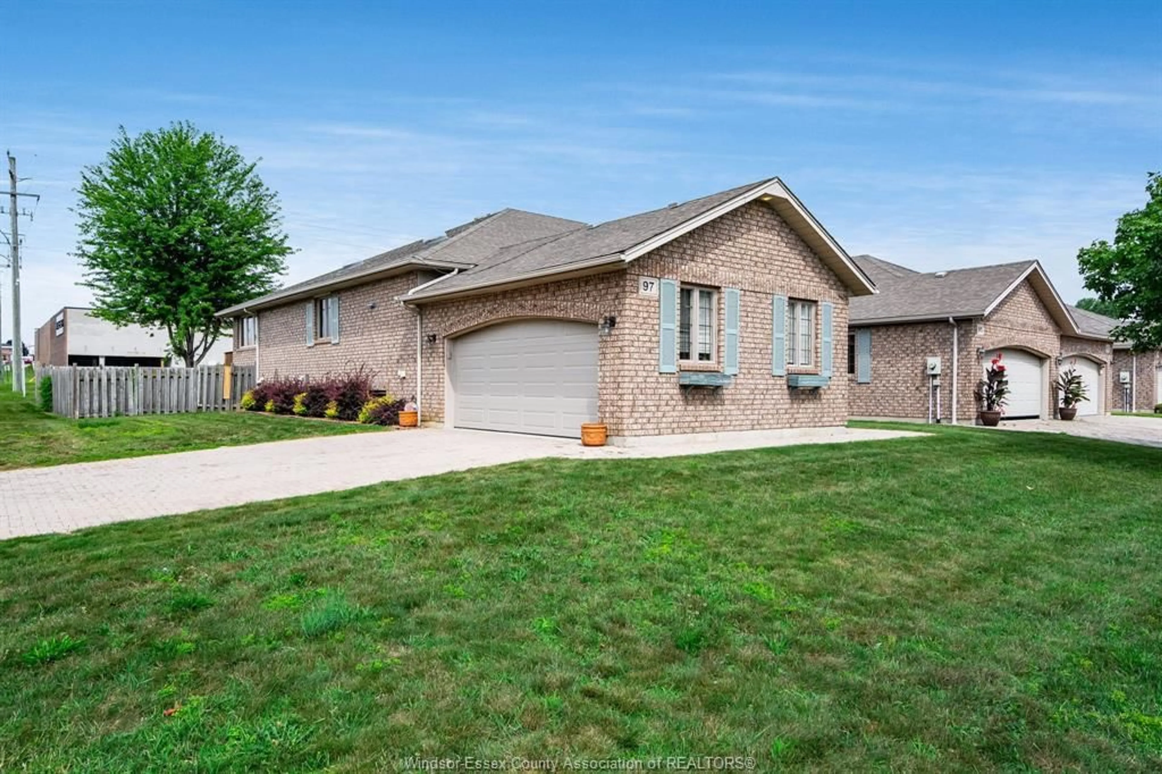 Home with brick exterior material, street for 97 Theresa Trail, Leamington Ontario N8H 5M8