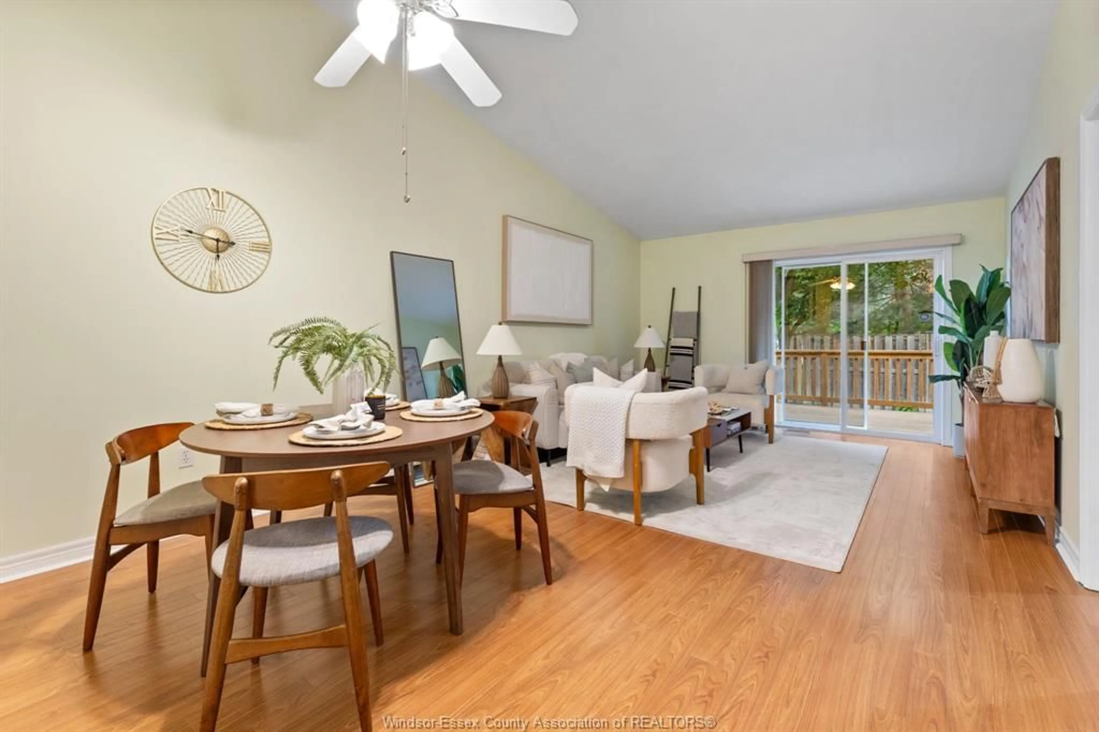 Living room with furniture, wood/laminate floor for 3778 PRAIRIE Crt, Windsor Ontario N9G 2X3