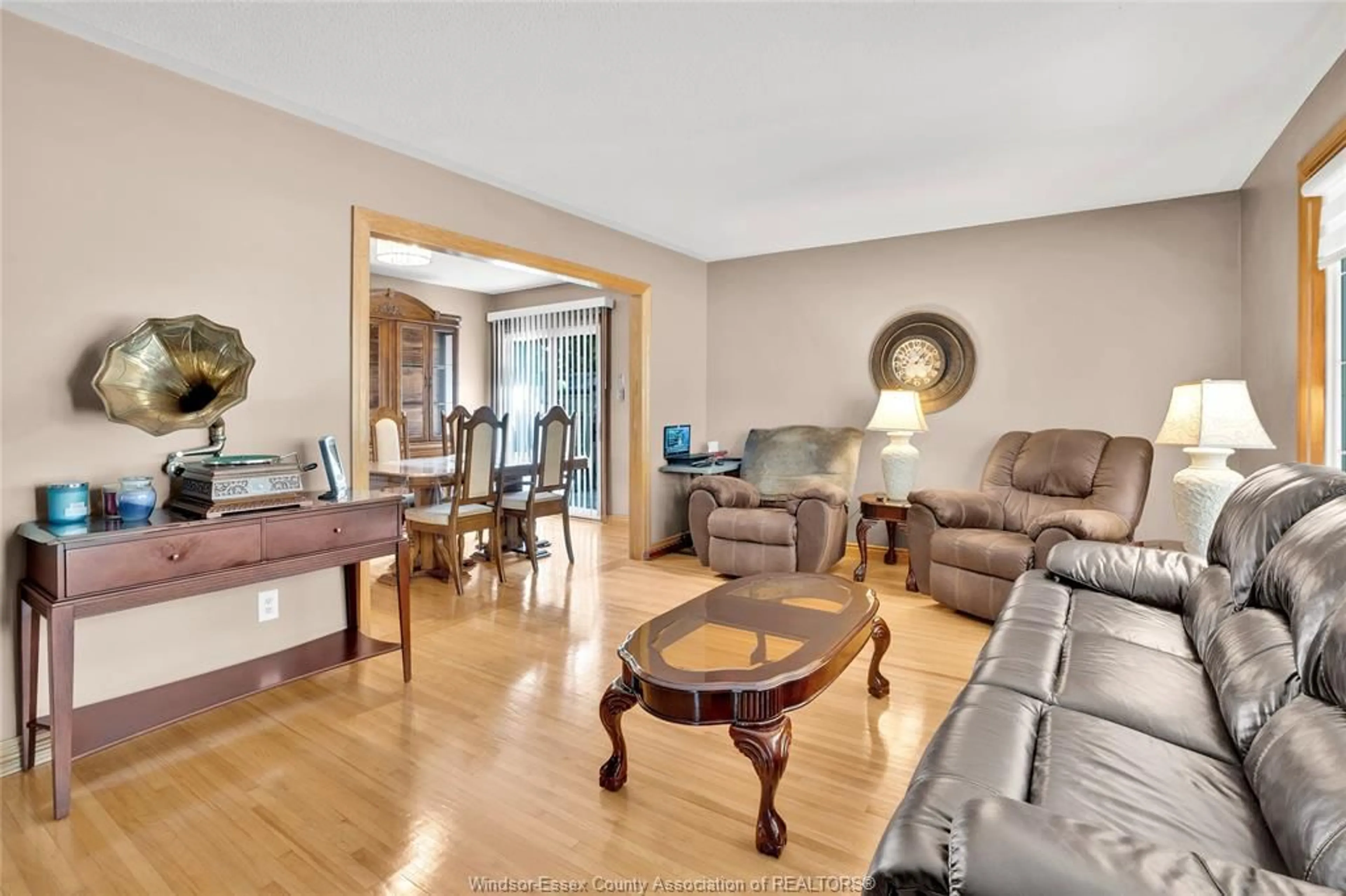 Living room with furniture, wood/laminate floor for 2664 RIVARD Ave, Windsor Ontario N8T 2H5