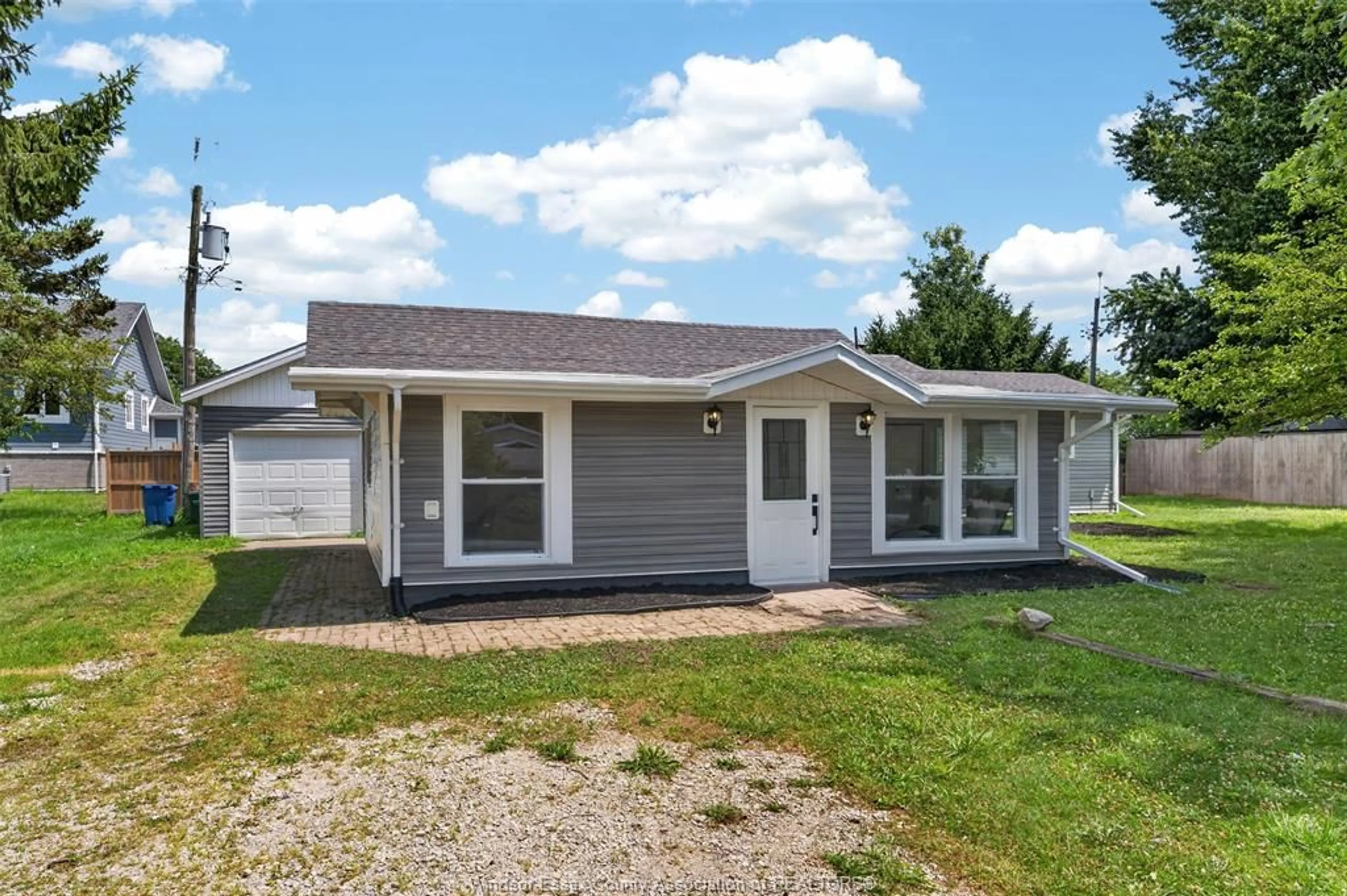 Home with vinyl exterior material, street for 134 WINDSOR Ave, Harrow Ontario N0R 1G0