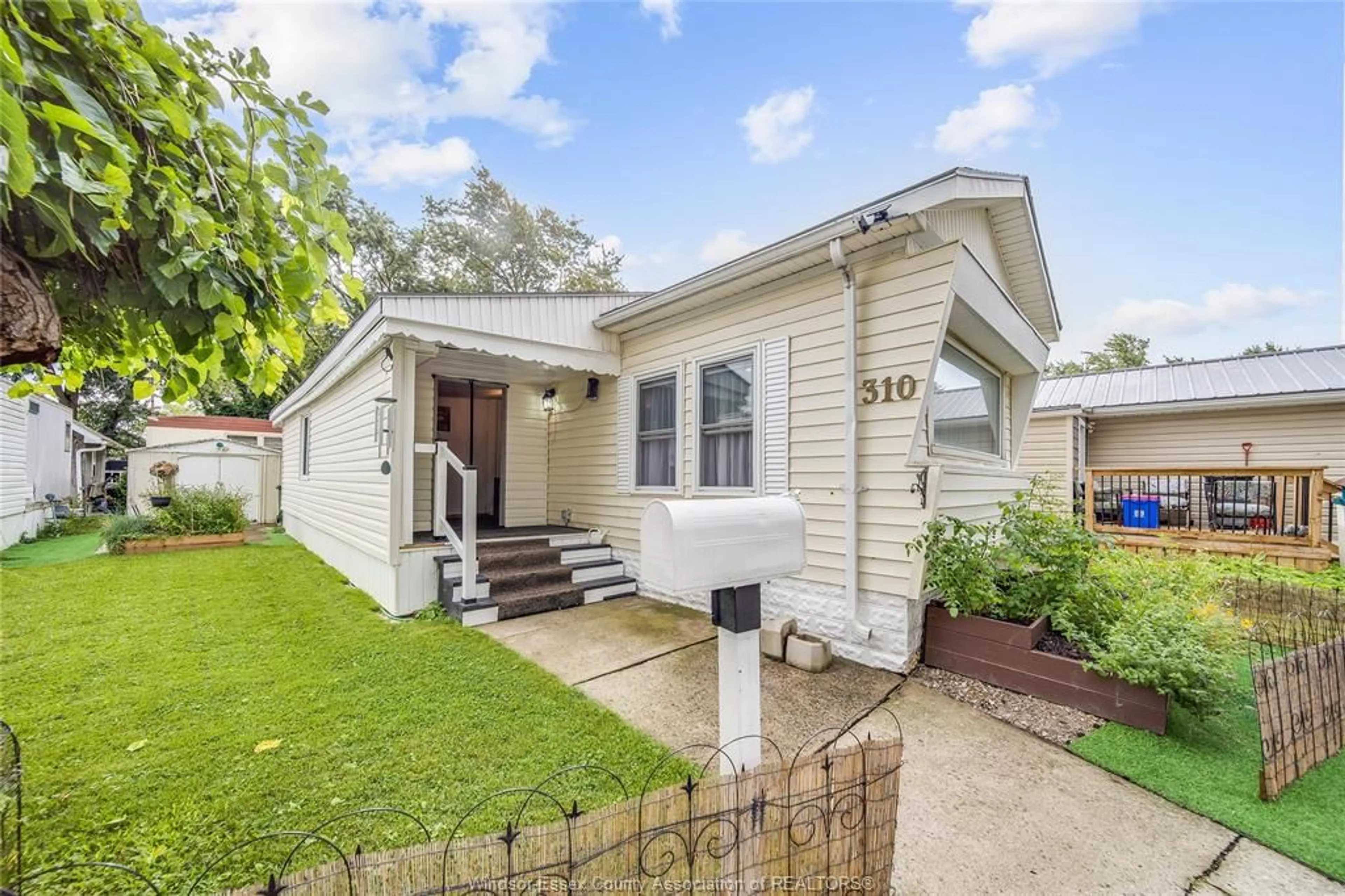 Home with vinyl exterior material, street for 310 POMPANO Ave, Windsor Ontario N8W 2A7