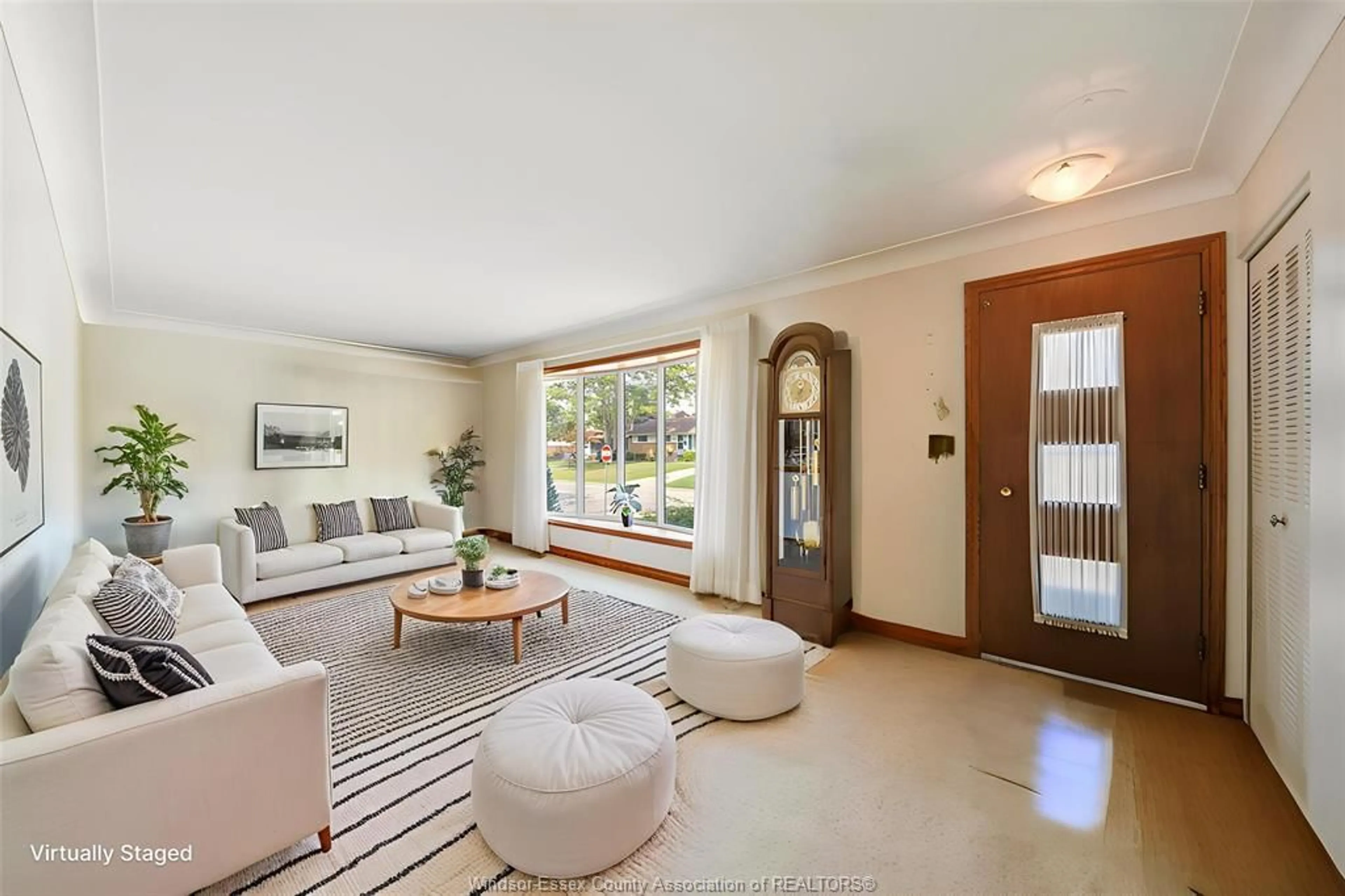 Living room with furniture, ceramic/tile floor for 3665 RANDOLPH Ave, Windsor Ontario N9E 3G4