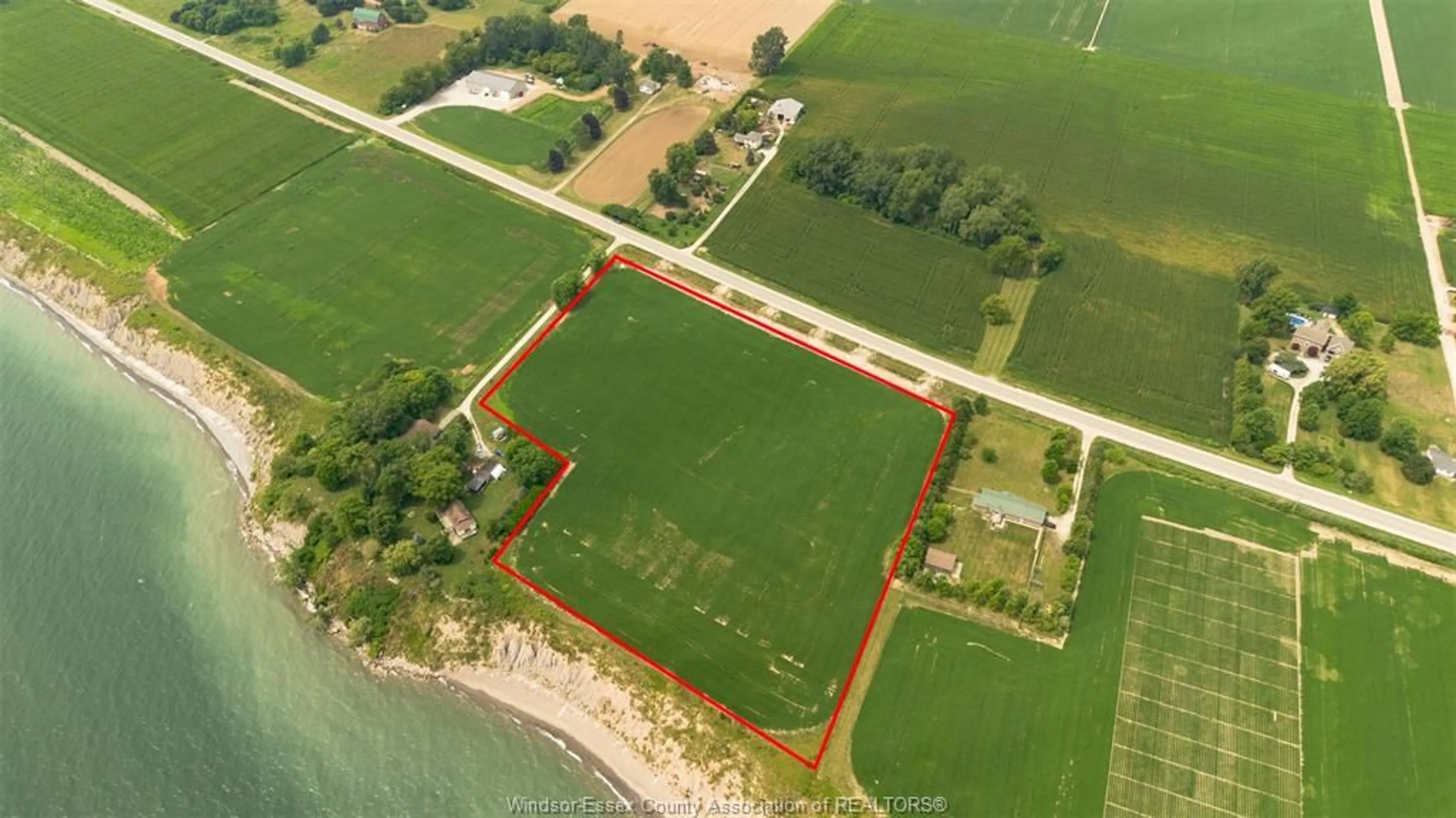 A pic from outside/outdoor area/front of a property/back of a property/a pic from drone, water/lake/river/ocean view for 2320 Cedar Rd, Wheatley Ontario N0P 2P0