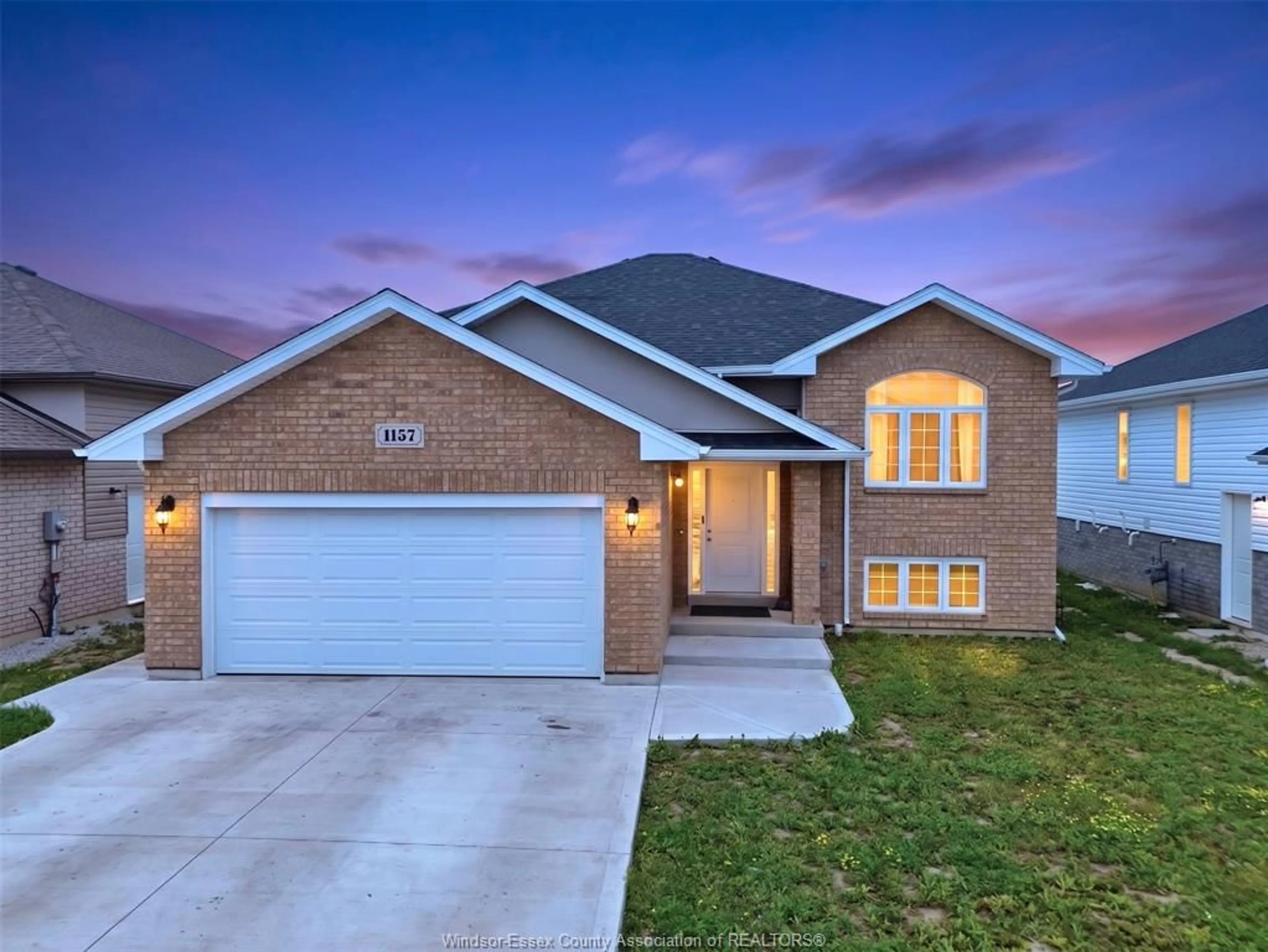 Home with brick exterior material, street for 1157 ASPEN RIDGE Cres, Lakeshore Ontario N0R 1A0
