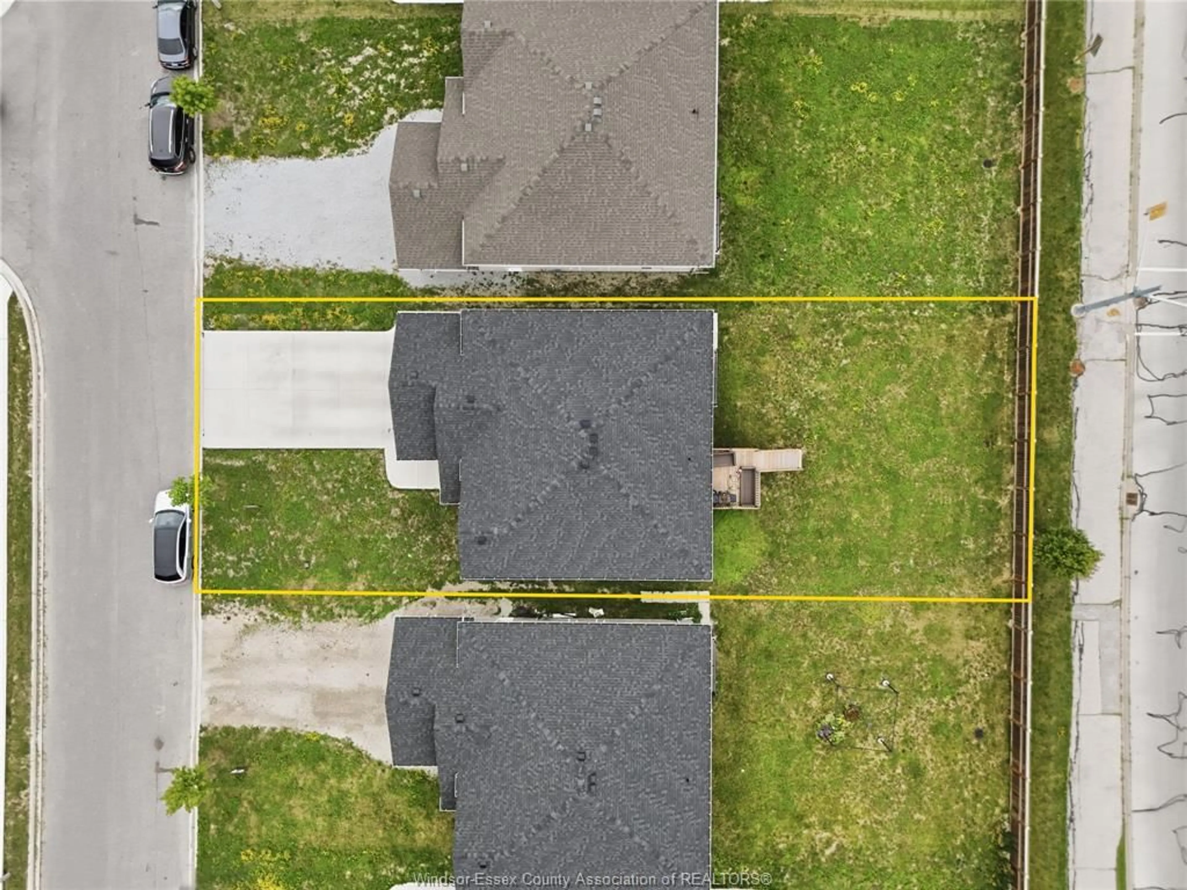 A pic from outside/outdoor area/front of a property/back of a property/a pic from drone, street for 1157 ASPEN RIDGE Cres, Lakeshore Ontario N0R 1A0