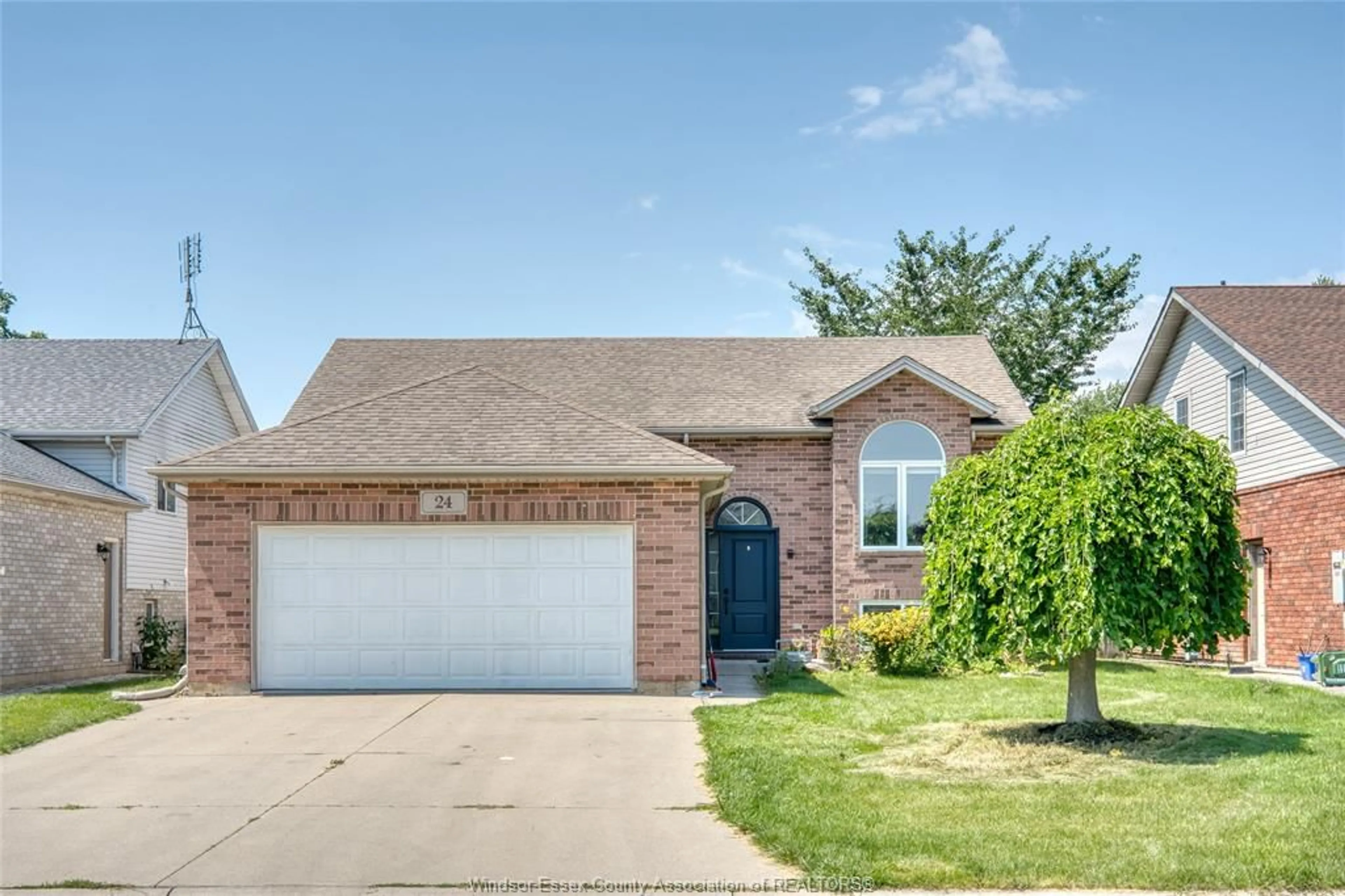 Home with brick exterior material, street for 24 BRIARWOOD, Essex Ontario N0R 1G0