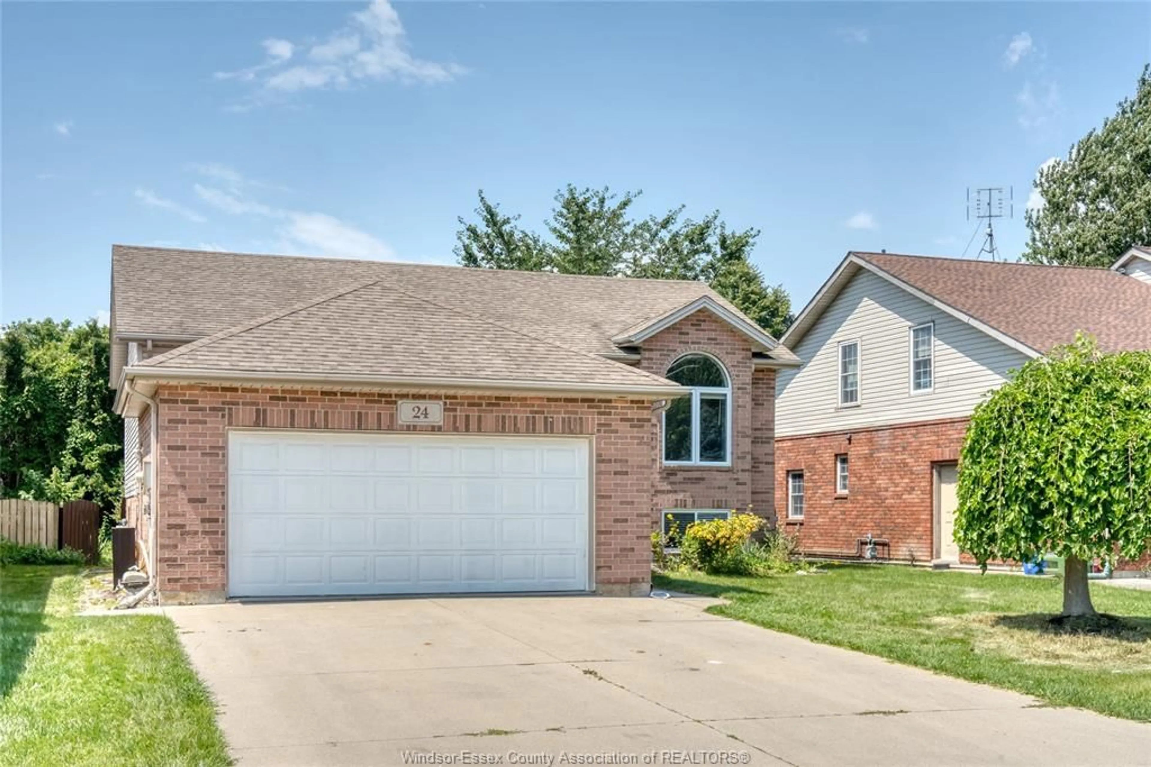 Home with brick exterior material, street for 24 BRIARWOOD, Essex Ontario N0R 1G0