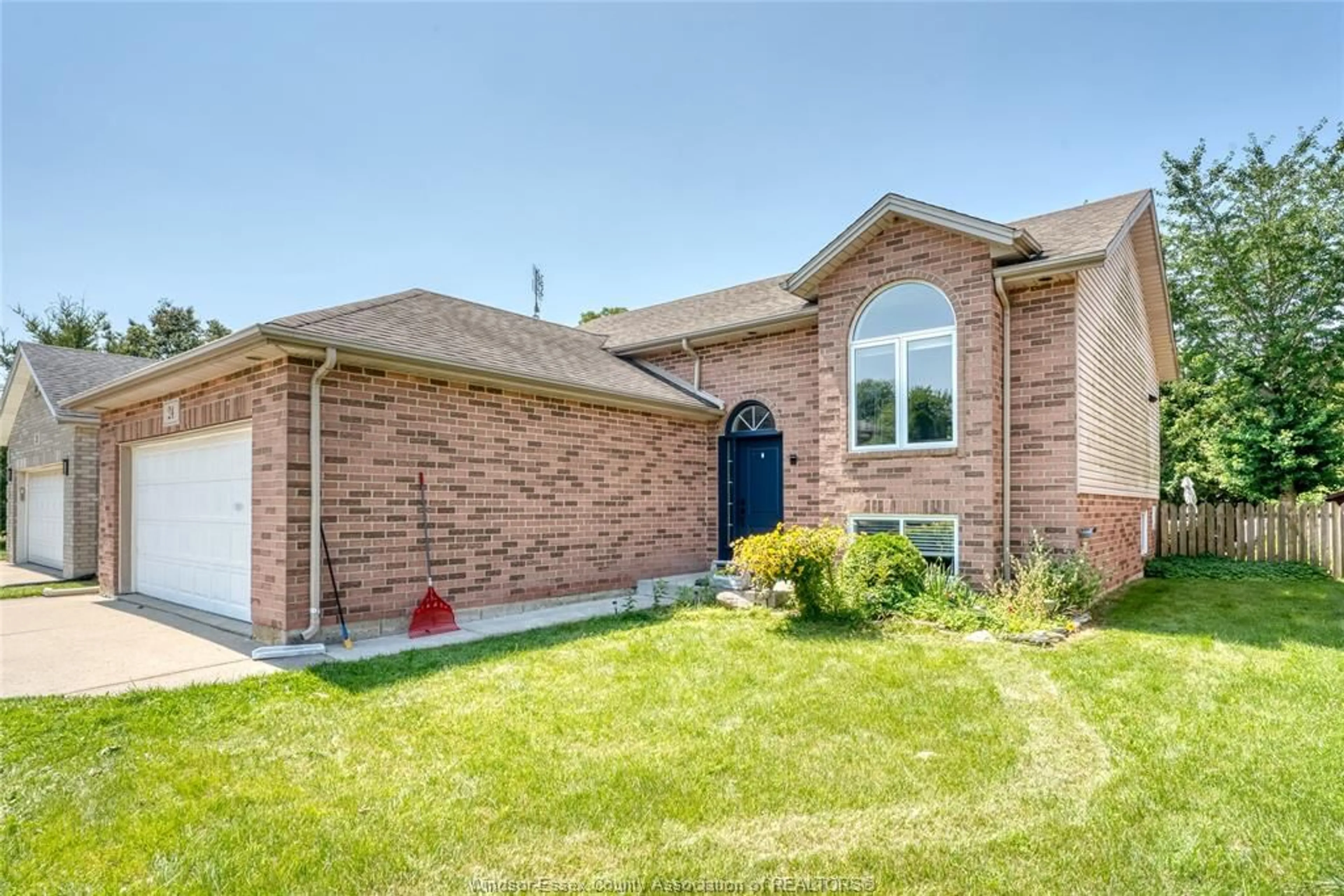 Home with brick exterior material, street for 24 BRIARWOOD, Essex Ontario N0R 1G0