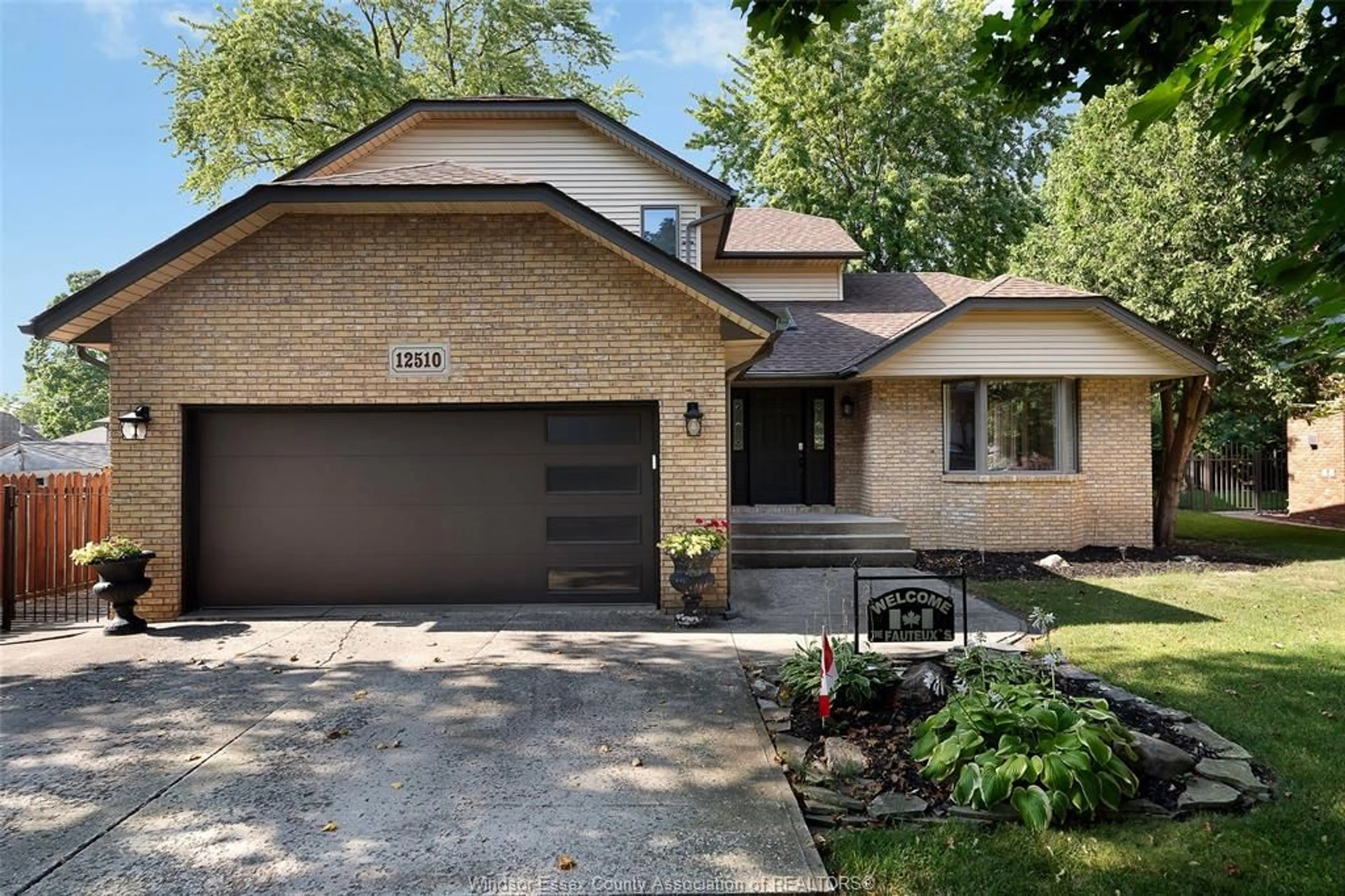 Home with brick exterior material, street for 12510 KEITH Cres, Tecumseh Ontario N8N 4A8