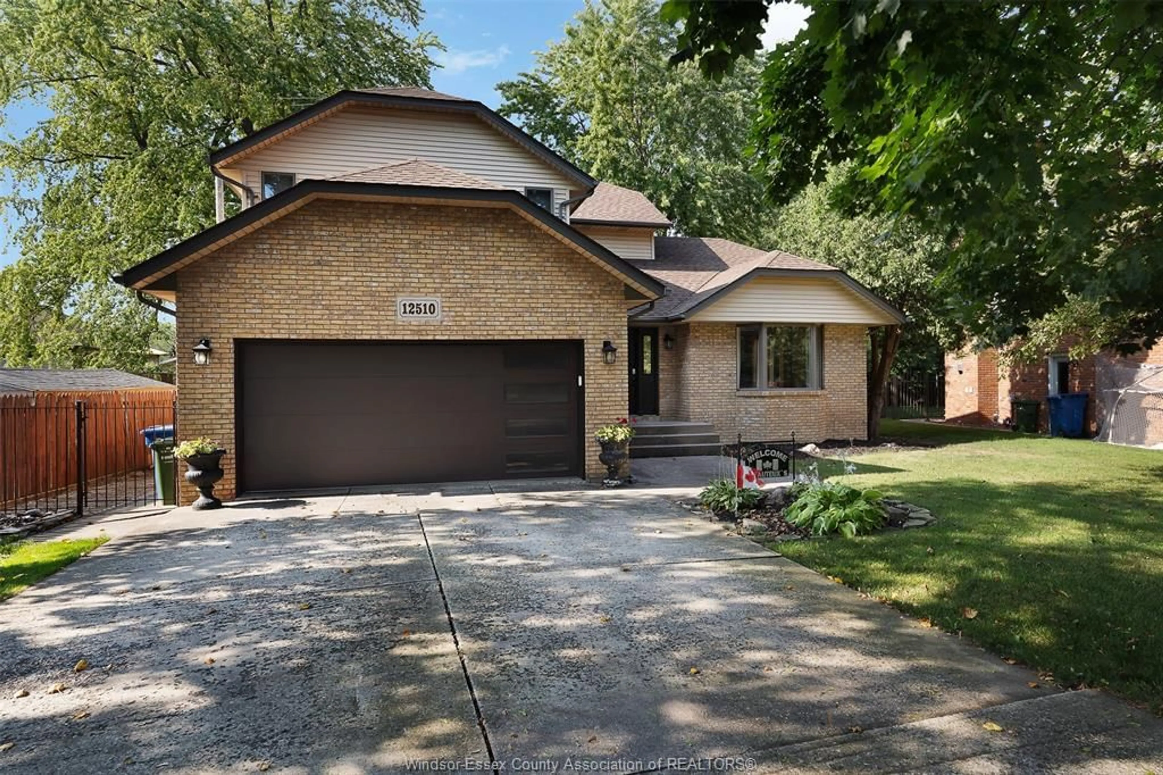 Home with brick exterior material, street for 12510 KEITH Cres, Tecumseh Ontario N8N 4A8