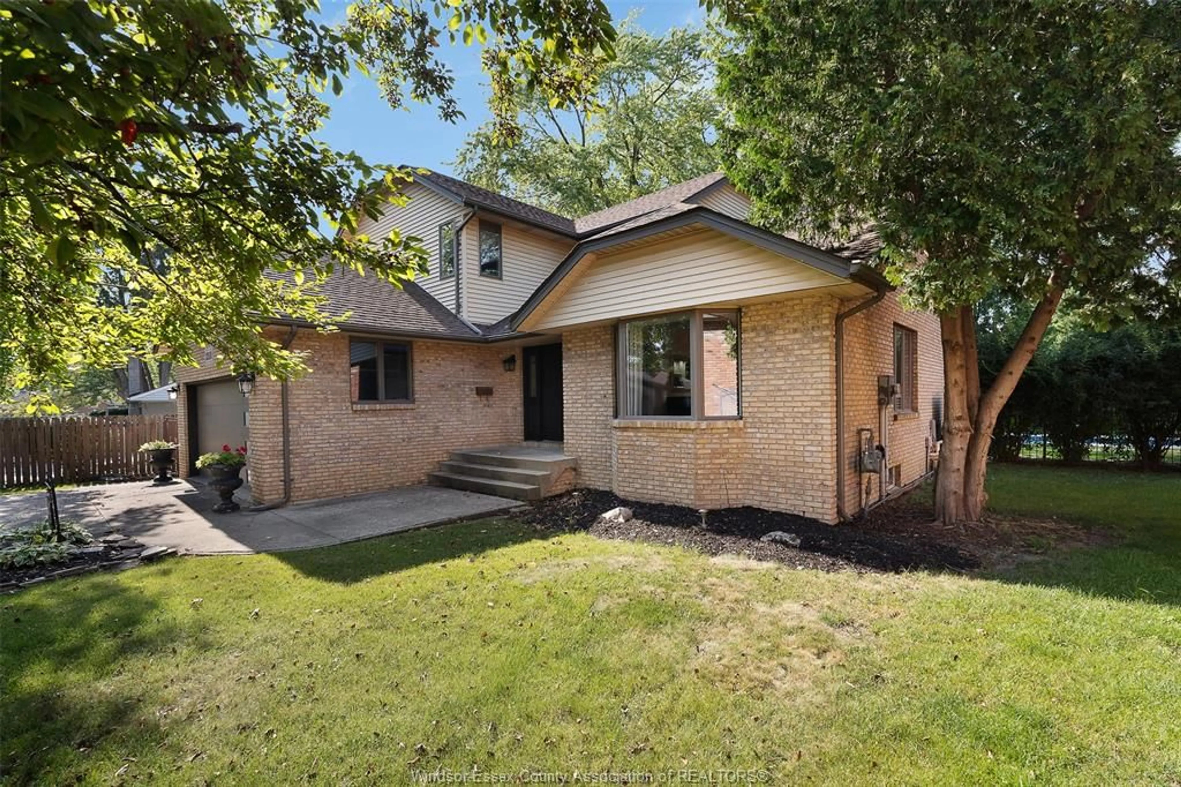 Home with brick exterior material, street for 12510 KEITH Cres, Tecumseh Ontario N8N 4A8