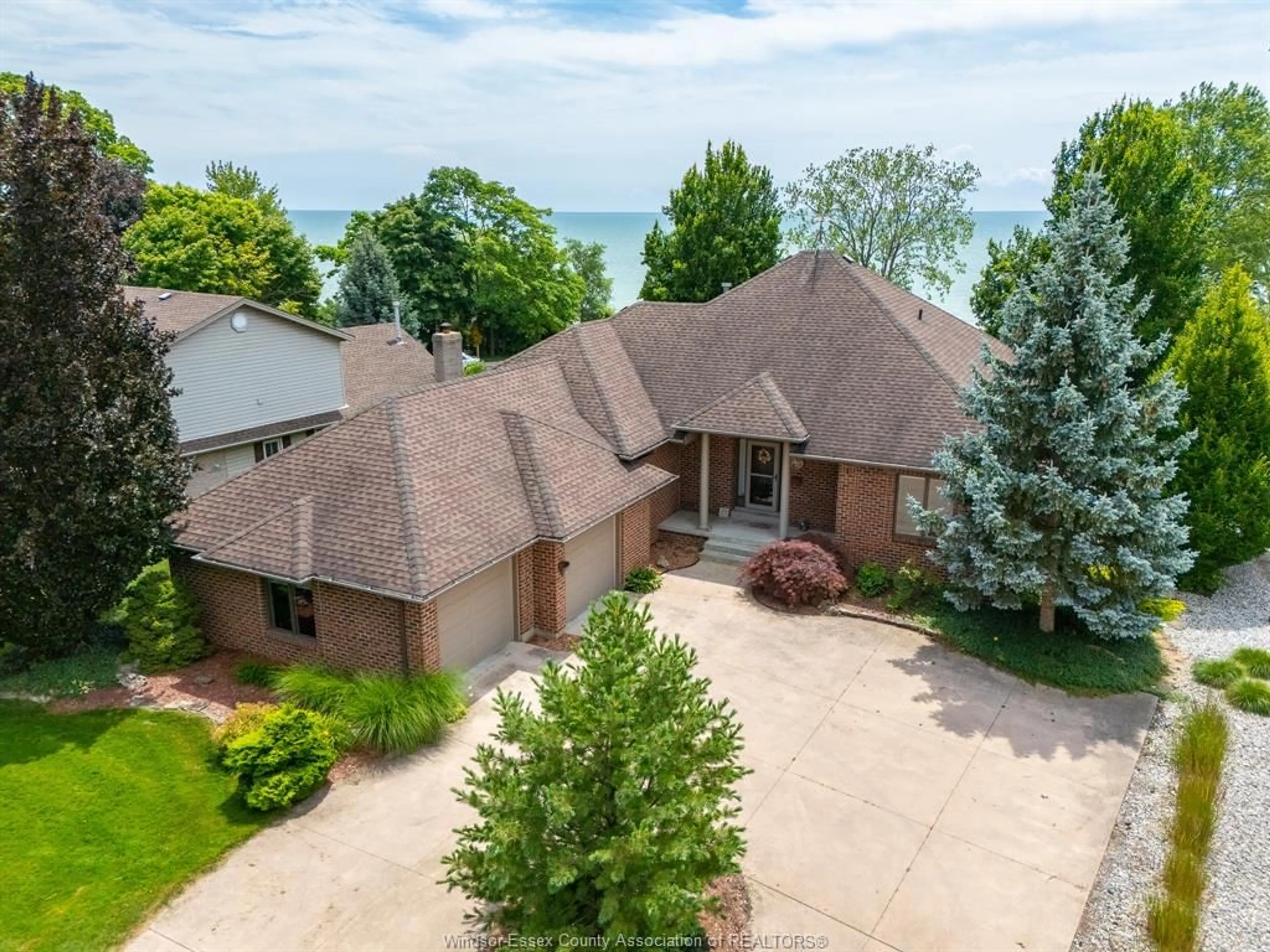 A pic from outside/outdoor area/front of a property/back of a property/a pic from drone, water/lake/river/ocean view for 501 LAKE DRIVE, Kingsville Ontario N9Y 3S6