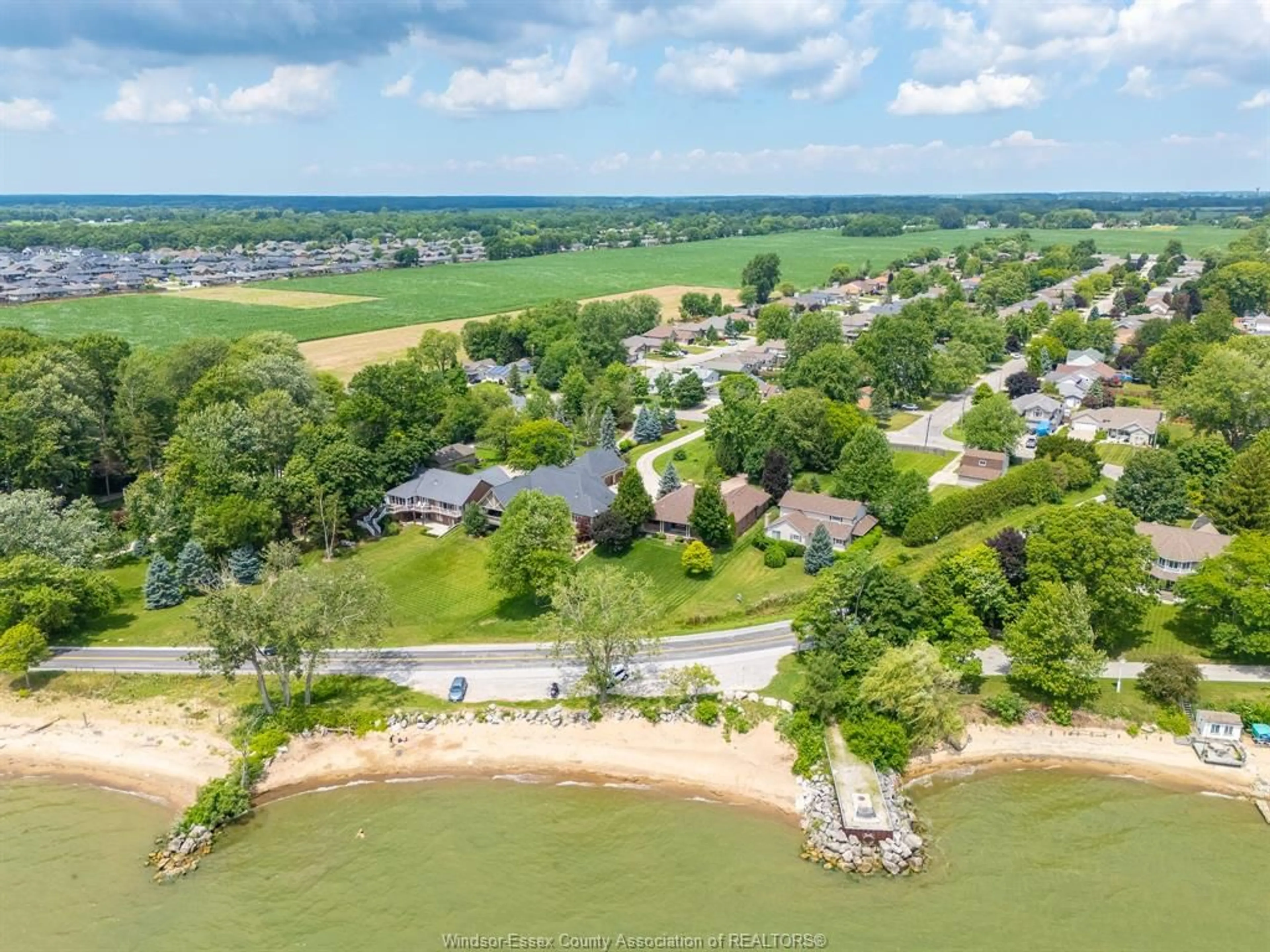 A pic from outside/outdoor area/front of a property/back of a property/a pic from drone, water/lake/river/ocean view for 501 LAKE DRIVE, Kingsville Ontario N9Y 3S6