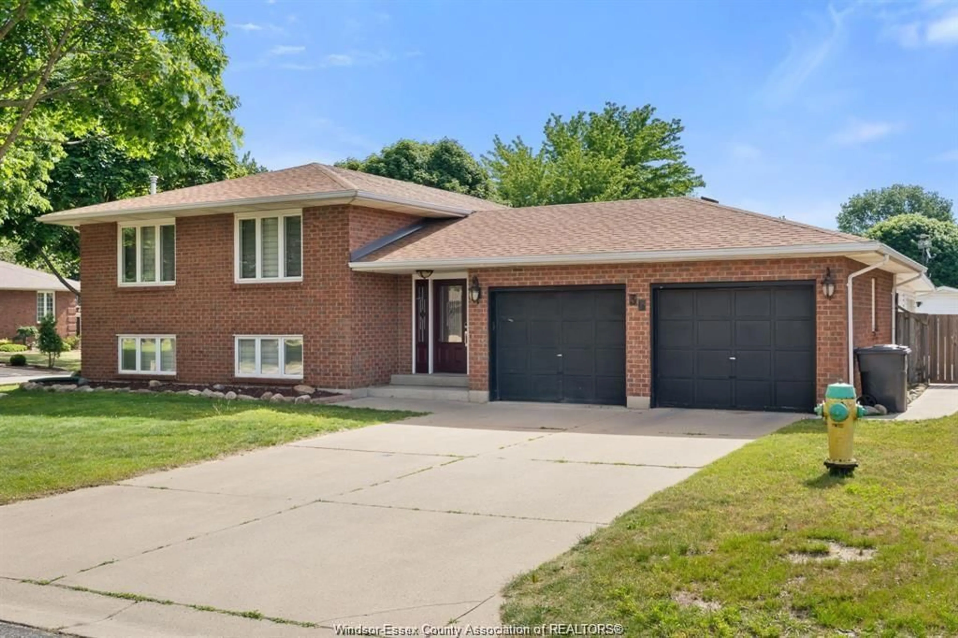 Home with brick exterior material, street for 36 CHERRYWOOD, Leamington Ontario N8H 4Z9