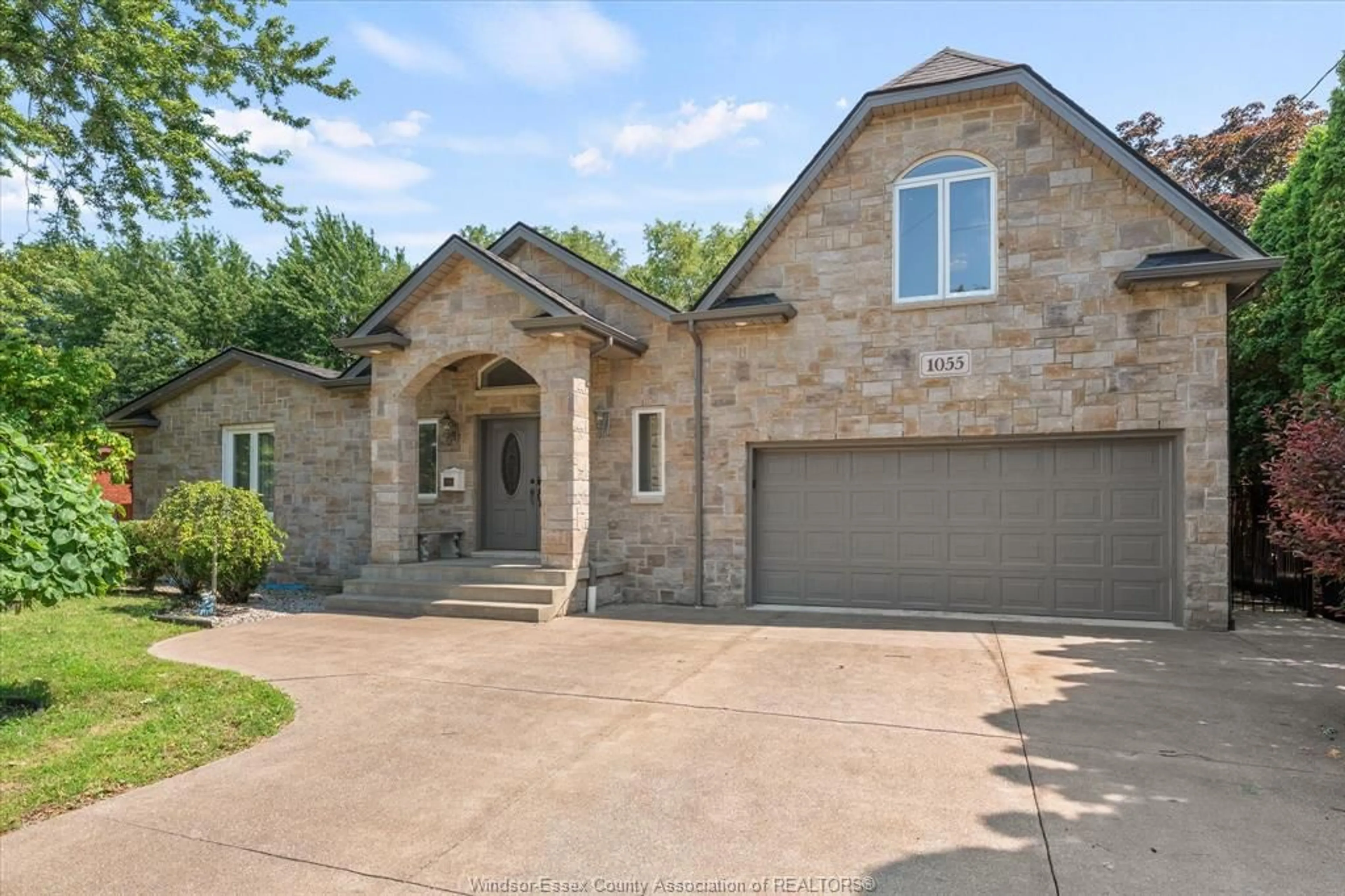 Home with brick exterior material, street for 1055 ROSELAND Dr, Windsor Ontario N9G 1T9