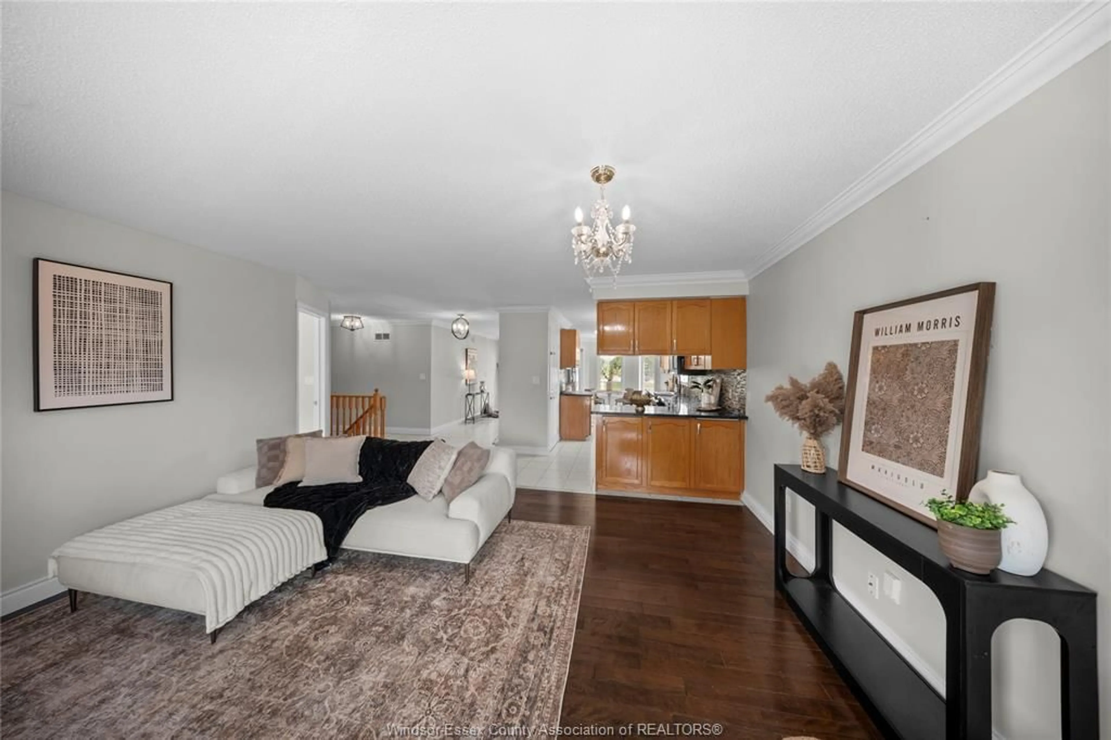 Living room with furniture, wood/laminate floor for 597 COMPTON, Windsor Ontario N9E 4P7