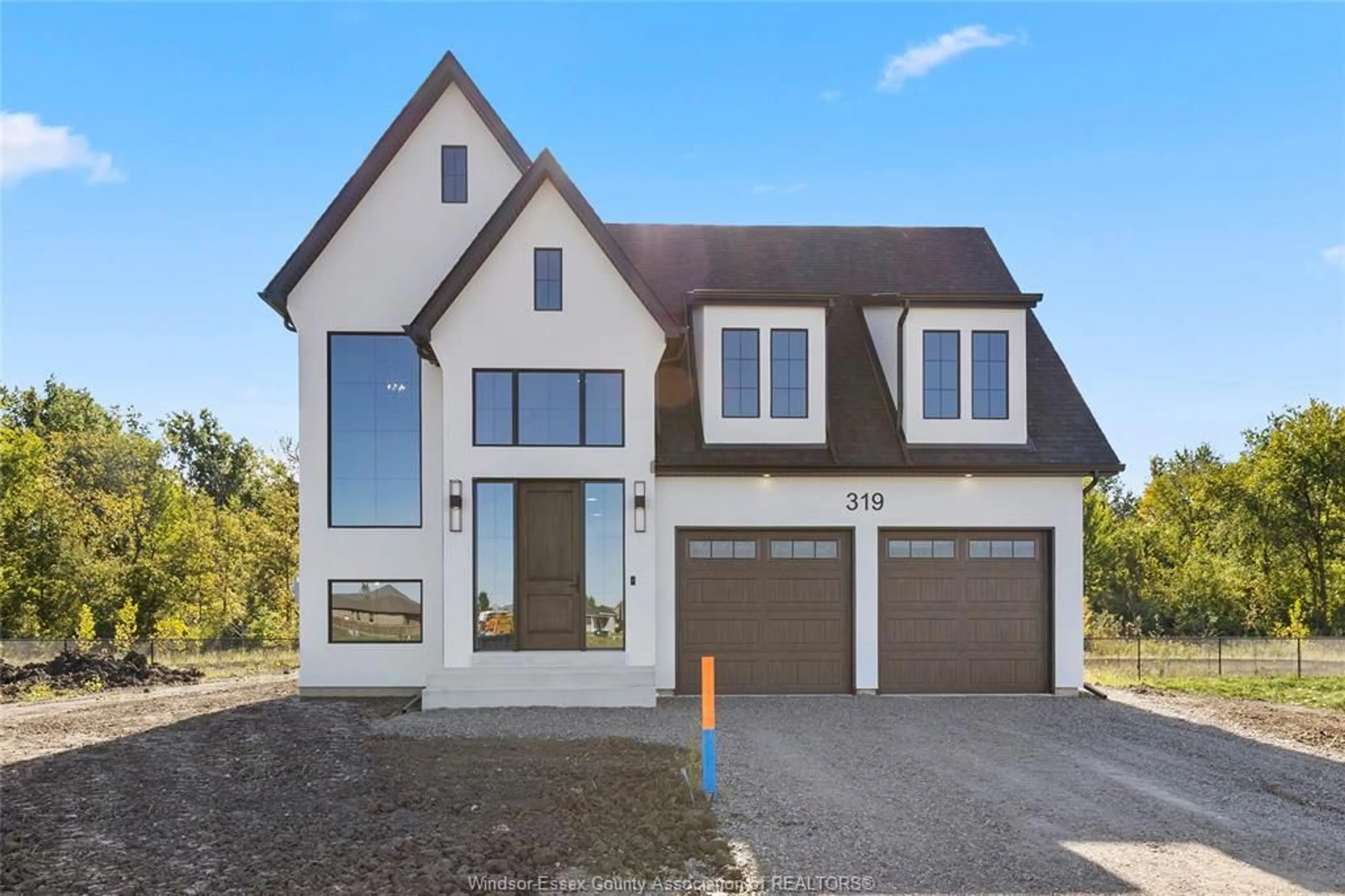 Home with brick exterior material, street for 361 MARLA Cres, Lakeshore Ontario N0R 1A0